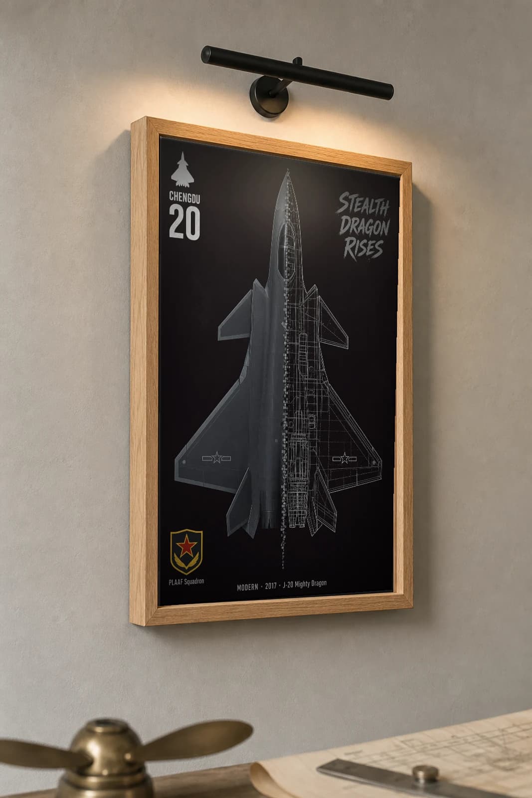 J-20 Cutaway Poster — Mighty Dragon Modern Split-View Blueprint Print — the framed print shown at a three-quarter angle on a styled gallery wall in a natural-oak frame