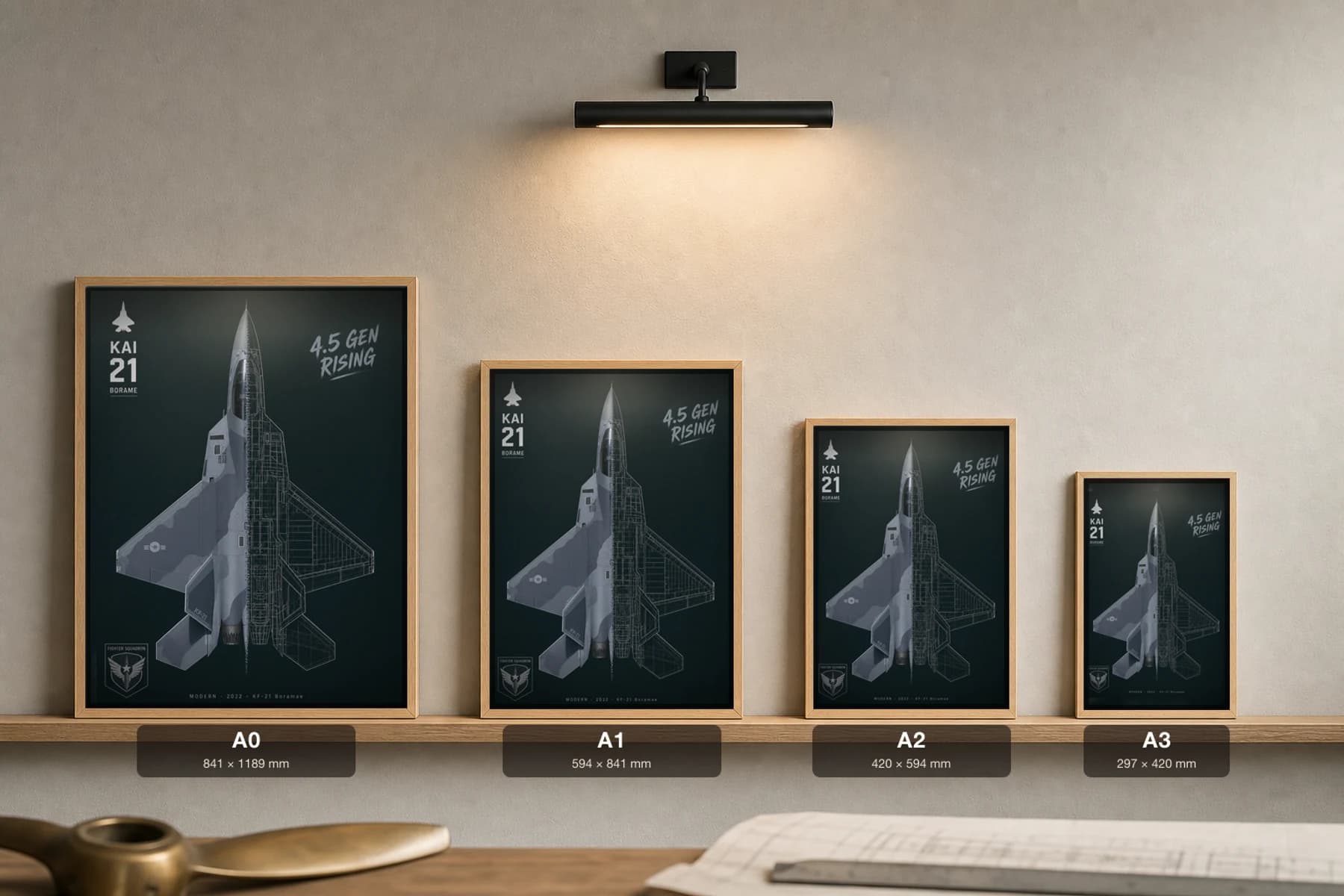 KF-21 Boramae Cutaway Poster — Block 1 Modern Split-View Blueprint Print — print size guide showing the artwork at A0, A1, A2 and A3 in natural-oak frames at true relative scale