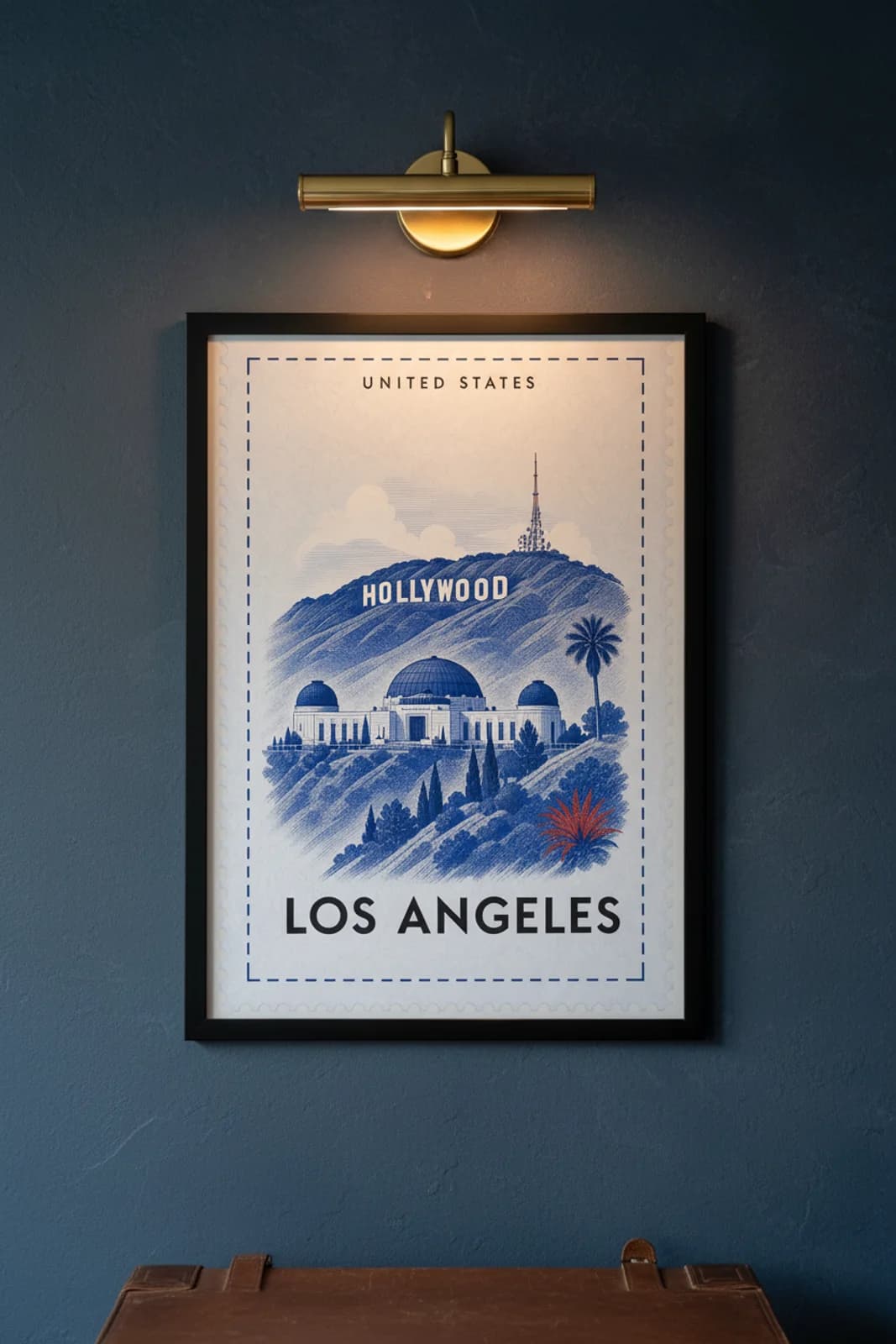 Los Angeles city stamp print in black A2 frame on wcs-americas-5185 postage-indigo wall — City Stamps mockup