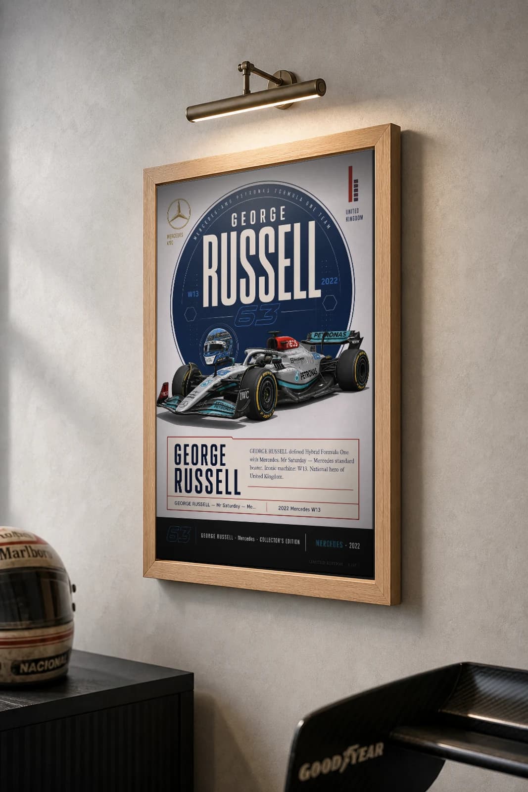 George Russell Poster — 2022 Mercedes W13 Hybrid F1 Heritage Collector Print — the framed print shown at a three-quarter angle on a styled gallery wall in a natural-oak frame