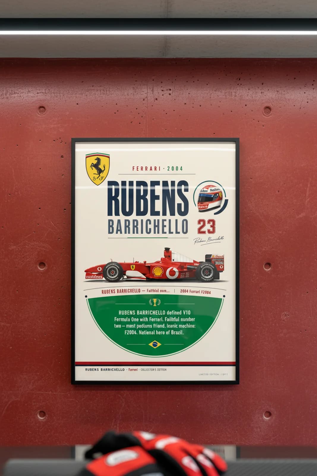 Rubens Barrichello poster in black A2 frame on rosso-corsa-red polished concrete wall — F1 heritage collector mockup