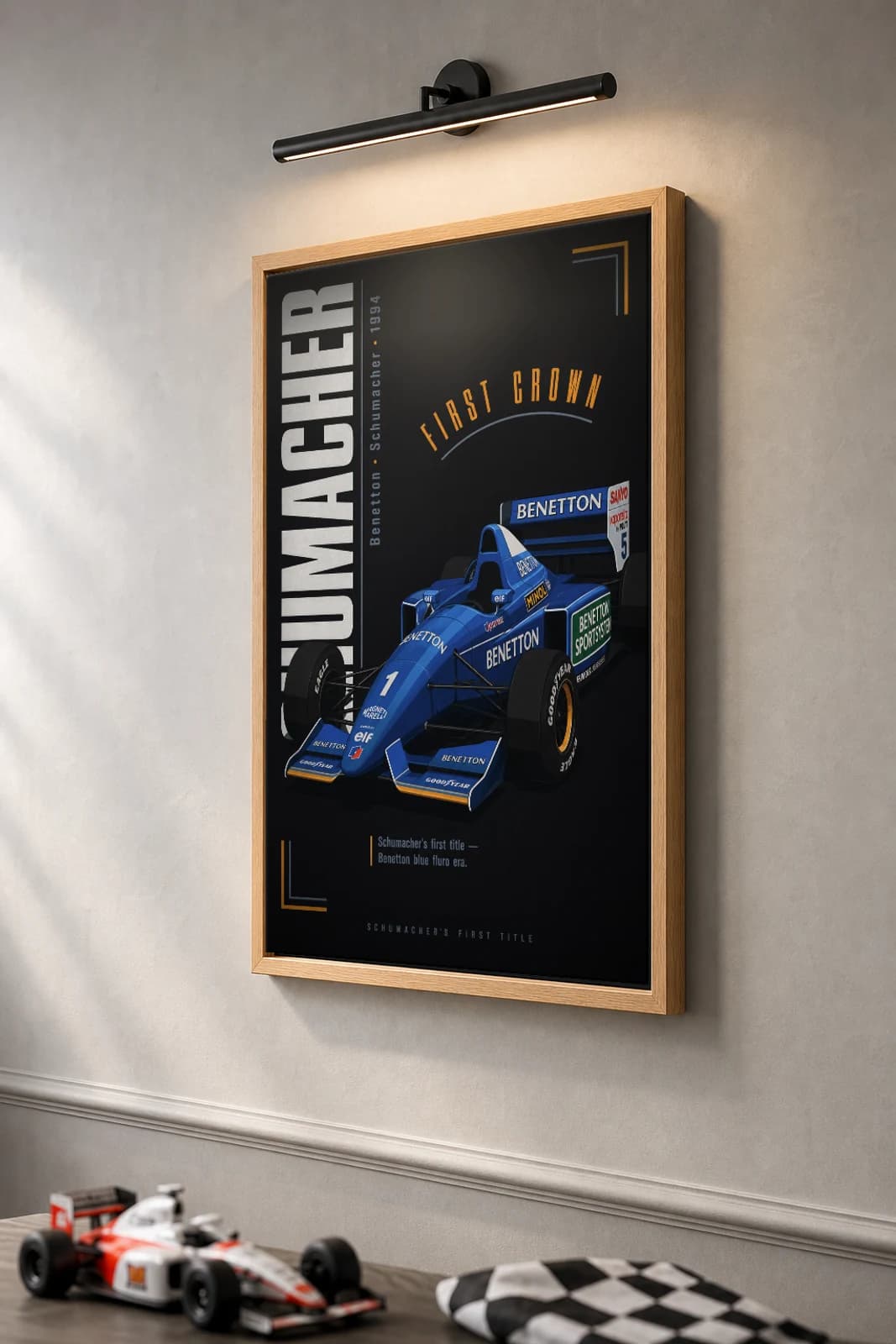 Michael Schumacher — Michael Schumacher — classic Benetton 94 heritage plate Poster — 94 F1 Grid Editorial Wall Art · framed A2 — the framed print shown at a three-quarter angle on a styled gallery wall in a natural-oak frame