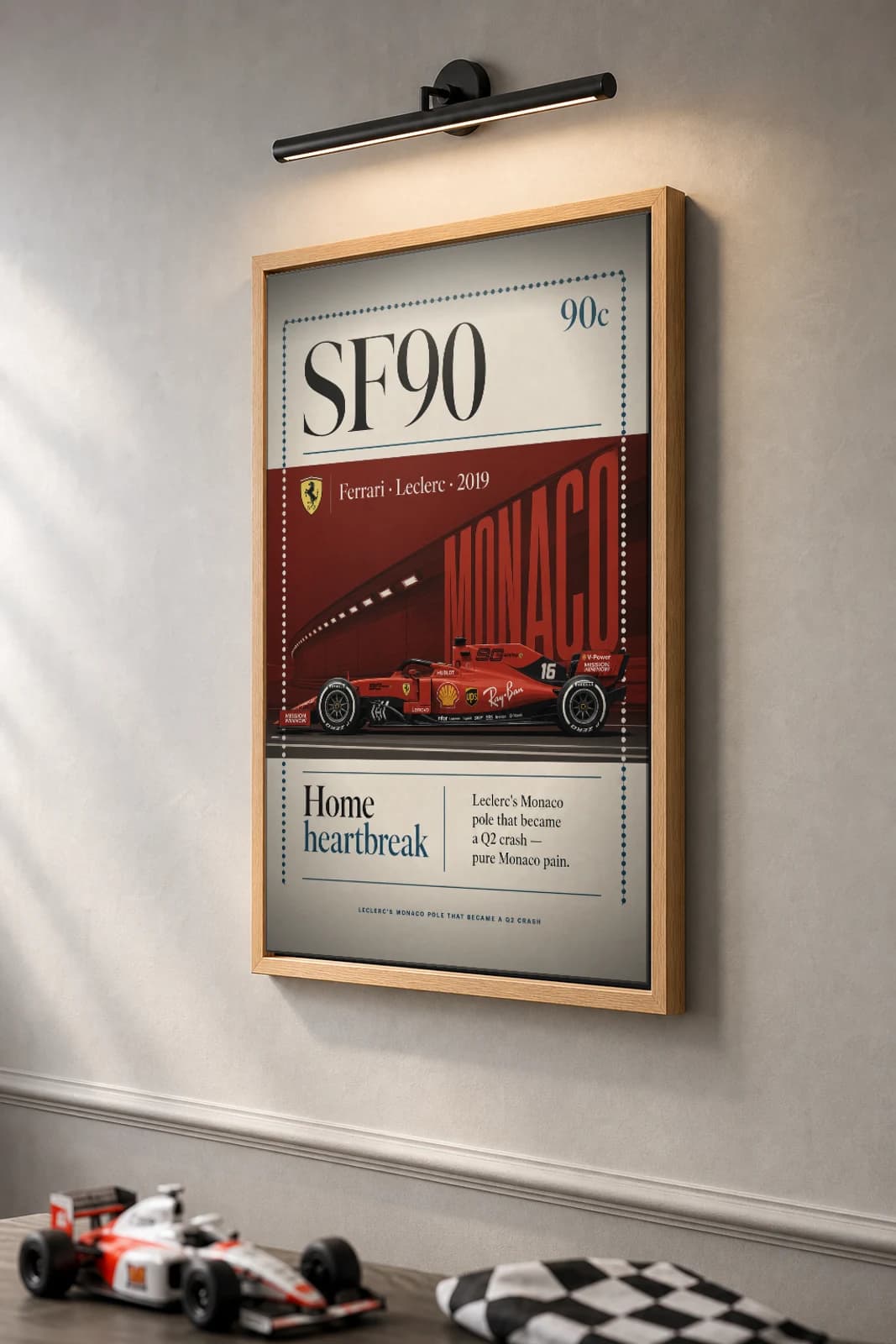 Charles Leclerc — Monaco 2019 Ferrari pole heartbreak Poster — 2019 F1 Grid Editorial Wall Art · framed A2 — the framed print shown at a three-quarter angle on a styled gallery wall in a natural-oak frame