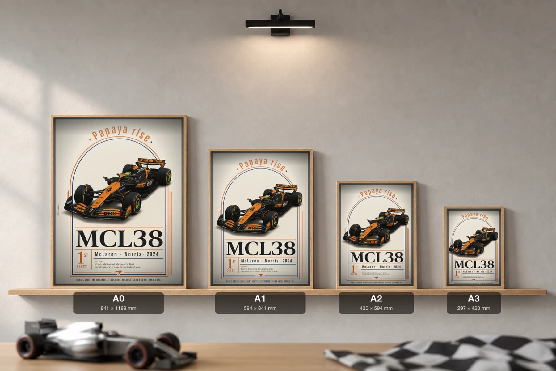 Lando Norris — 2024 McLaren resurgence Poster — 2024 F1 Grid Editorial Wall Art · framed A2 — print size guide showing the artwork at A0, A1, A2 and A3 in natural-oak frames at true relative scale