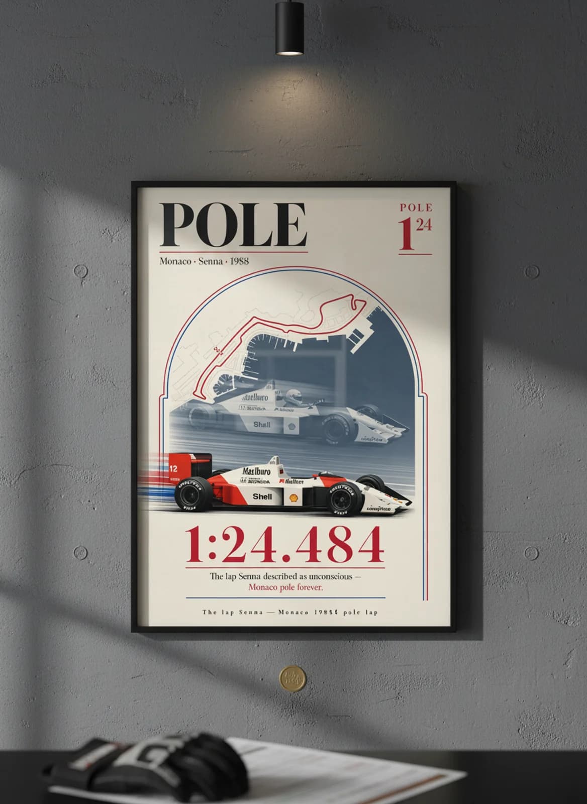 Ayrton Senna — Monaco 1988 pole lap F1 Grid print in black A2 frame on gold-seal-accent editorial-slate wall — Formula 1 media room mockup