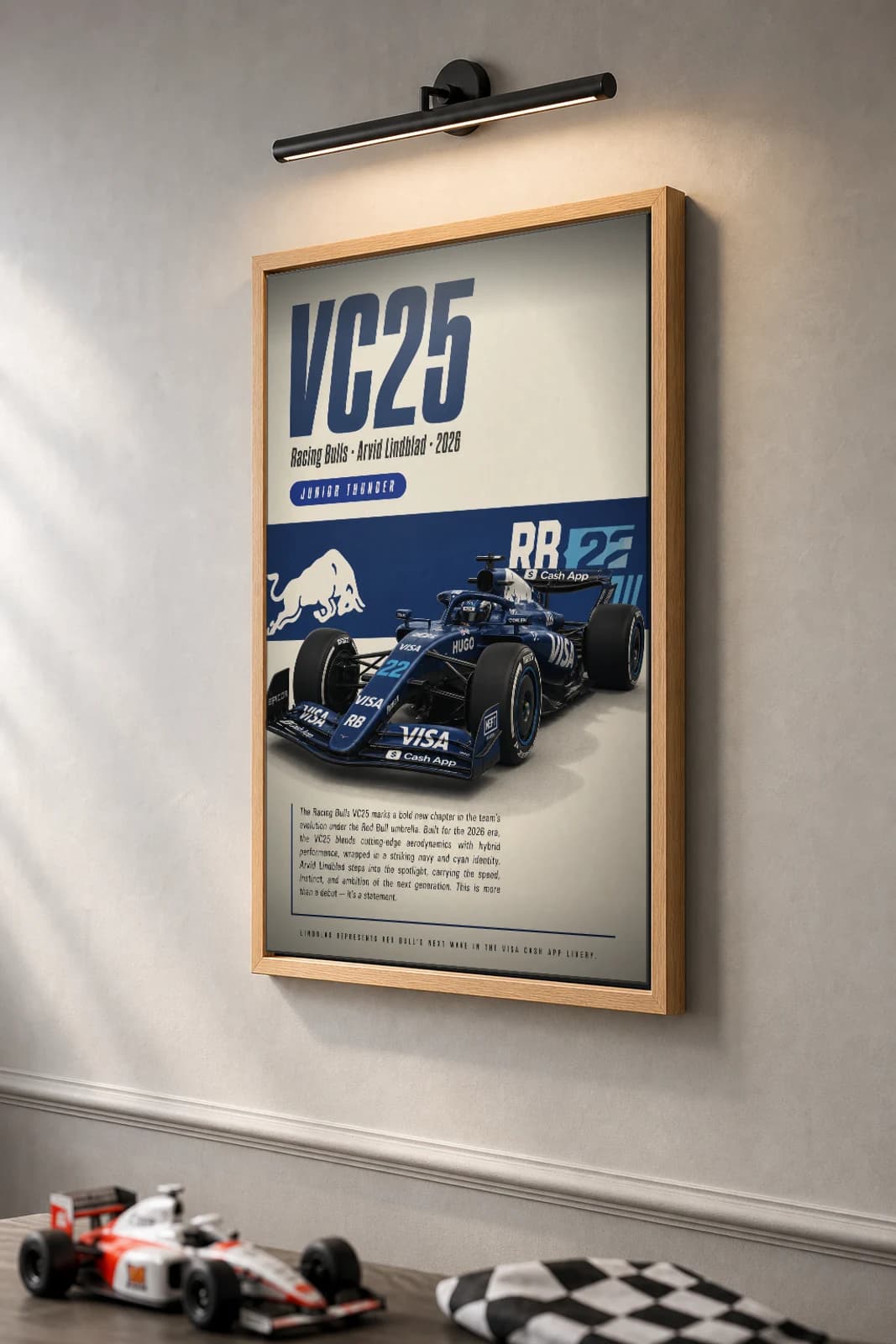 Racing Bulls VC25 — Arvid Lindblad Poster — undefined F1 Grid Editorial Wall Art · framed A2 — the framed print shown at a three-quarter angle on a styled gallery wall in a natural-oak frame
