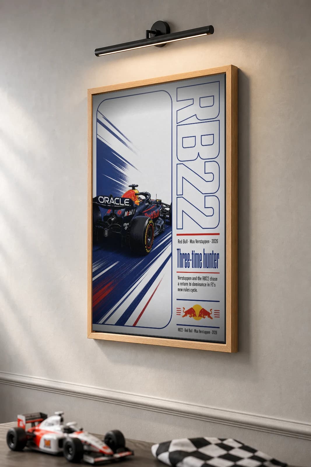 Red Bull Racing RB22 — Max Verstappen Poster — undefined F1 Grid Editorial Wall Art · framed A2 — the framed print shown at a three-quarter angle on a styled gallery wall in a natural-oak frame