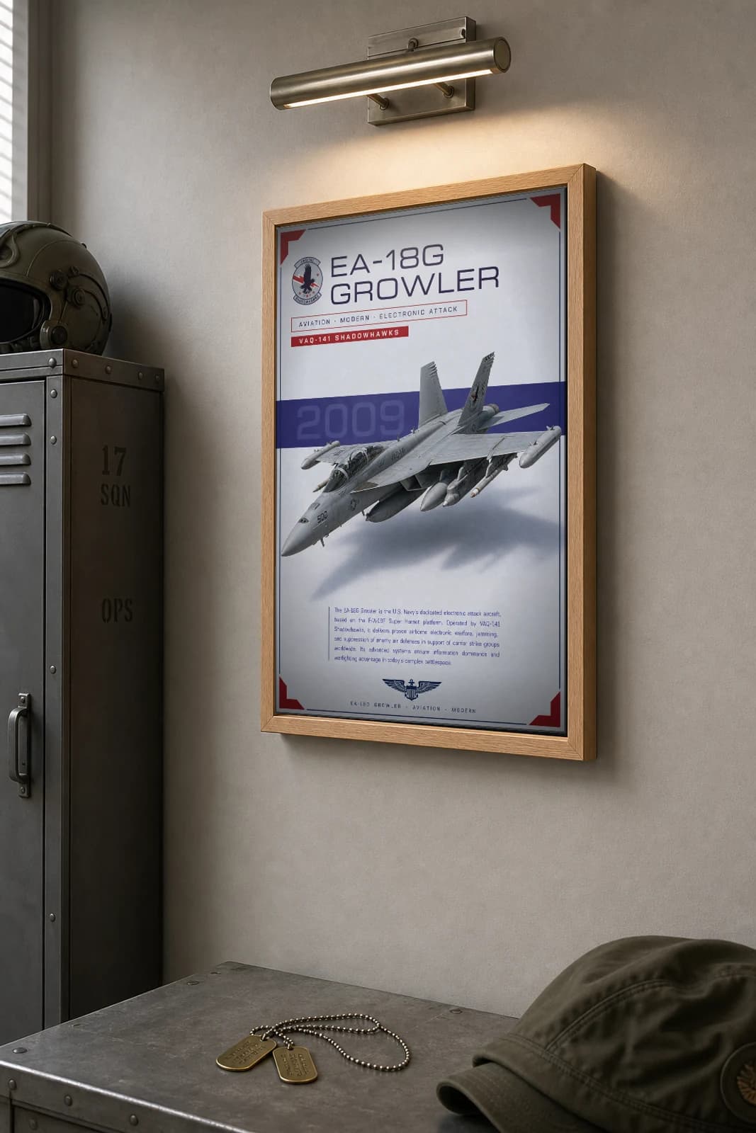 EA-18G Growler Poster — VAQ-141 Shadowhawks military aviation wall art · framed A2 · 2009 — the framed print shown at a three-quarter angle on a styled gallery wall in a natural-oak frame