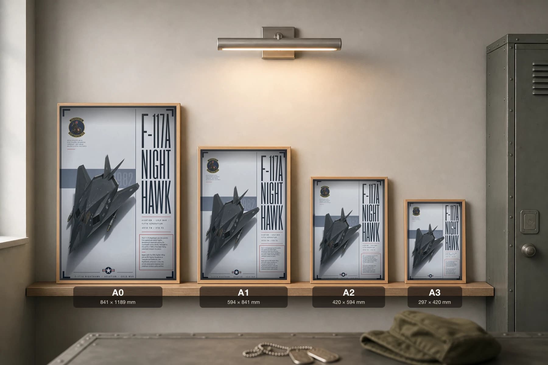 F-117 Nighthawk Poster — 49th FW / 9th FS military aviation wall art · framed A2 · 1982 — print size guide showing the artwork at A0, A1, A2 and A3 in natural-oak frames at true relative scale