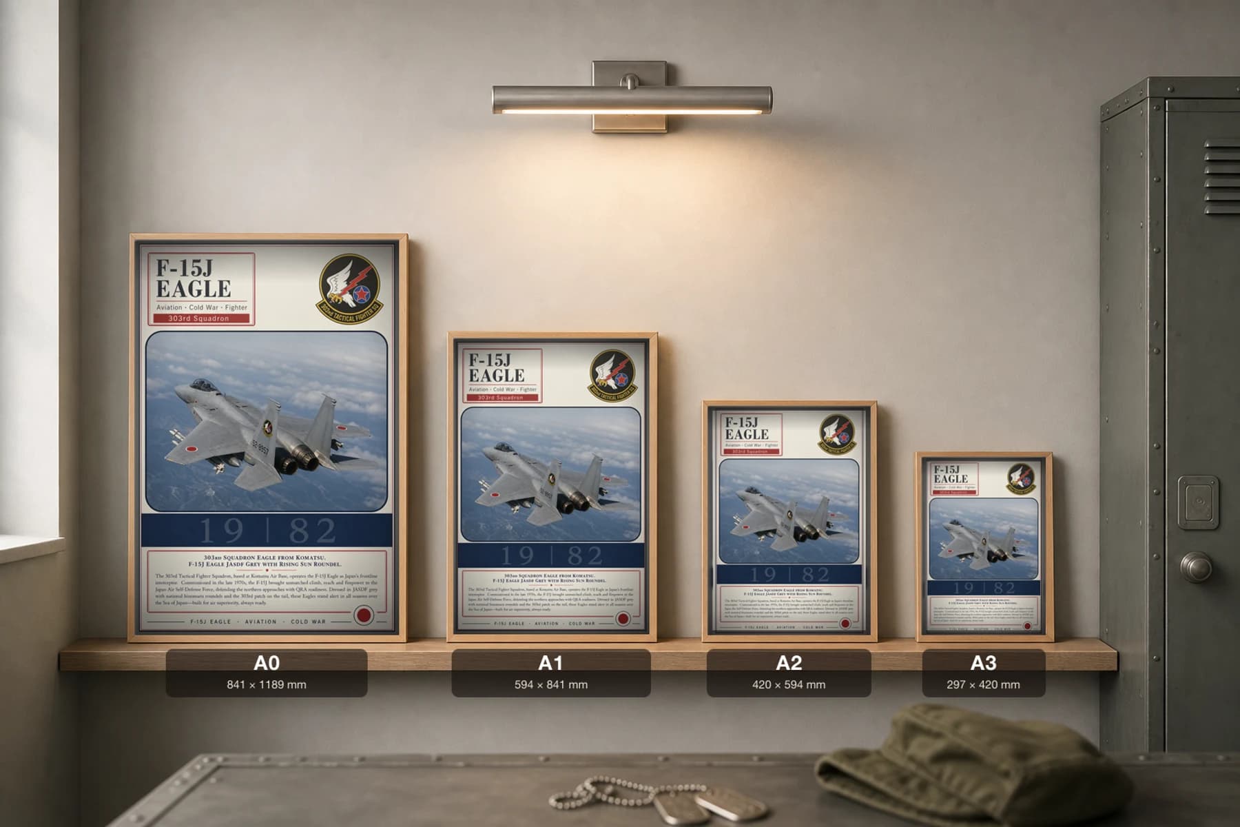F-15J Eagle Poster — 303rd Tactical Fighter Squadron military aviation wall art · framed A2 · 1982 — print size guide showing the artwork at A0, A1, A2 and A3 in natural-oak frames at true relative scale