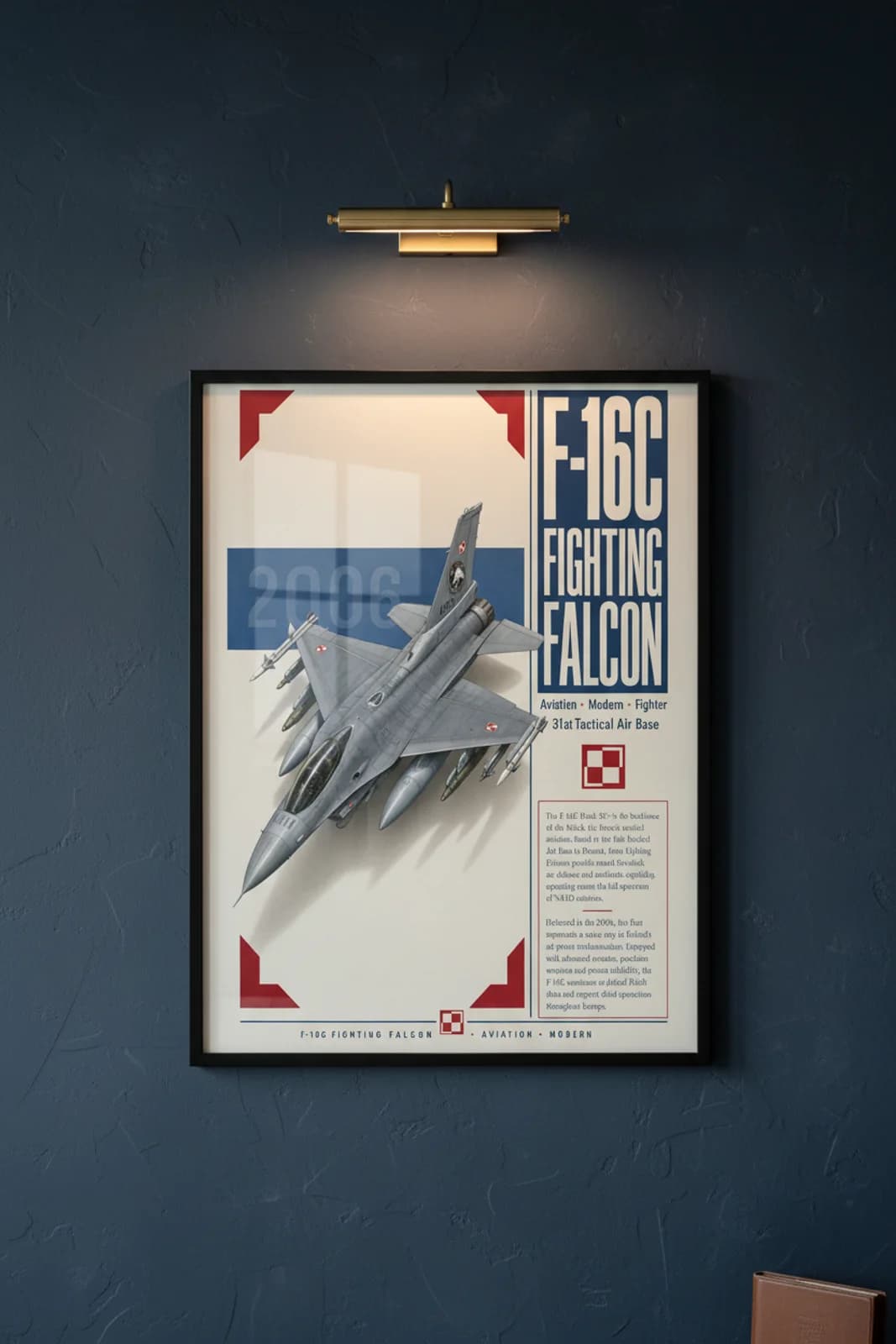 F-16C Fighting Falcon aviation poster in black A2 frame on low-vis-grey navy hangar wall — Aviation Heroes mockup