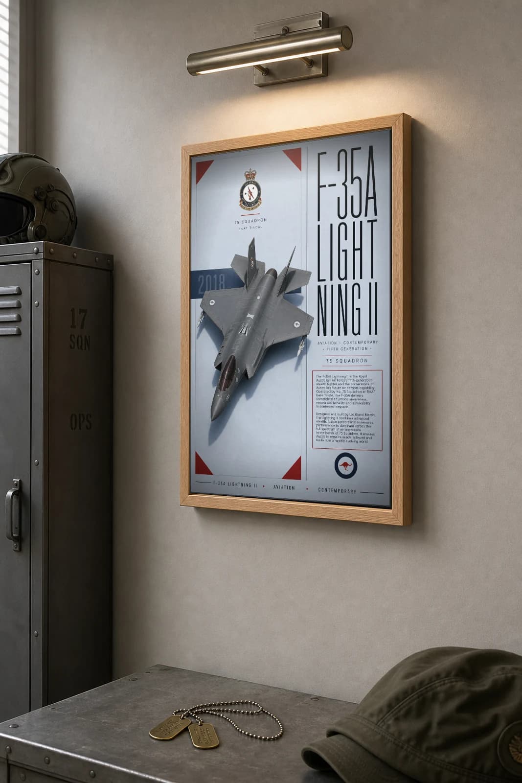 F-35 Lightning II Poster — 75 Squadron military aviation wall art · framed A2 · 2018 — the framed print shown at a three-quarter angle on a styled gallery wall in a natural-oak frame