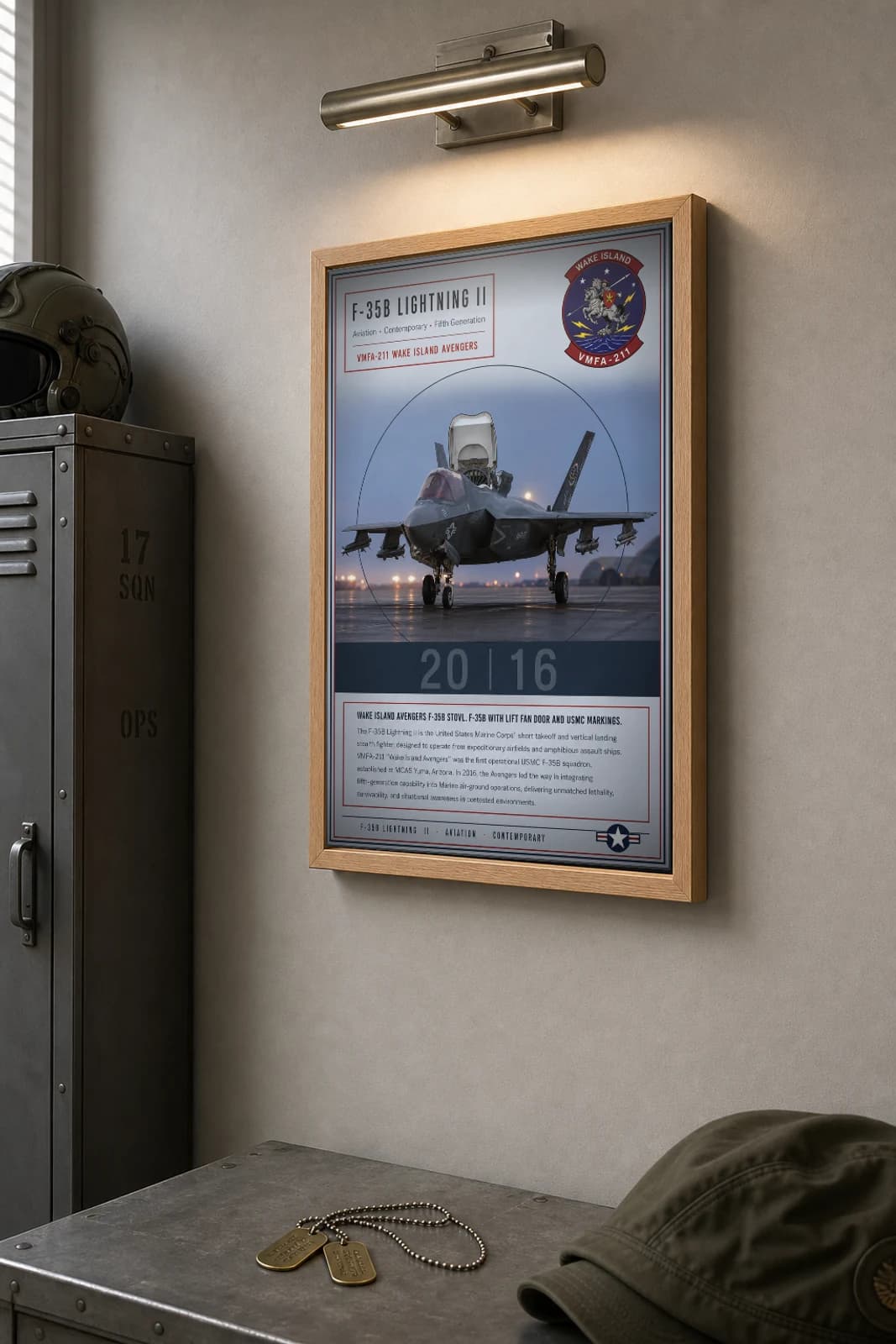 F-35B Lightning II Poster — VMFA-211 Wake Island Avengers military aviation wall art · framed A2 · 2016 — the framed print shown at a three-quarter angle on a styled gallery wall in a natural-oak frame