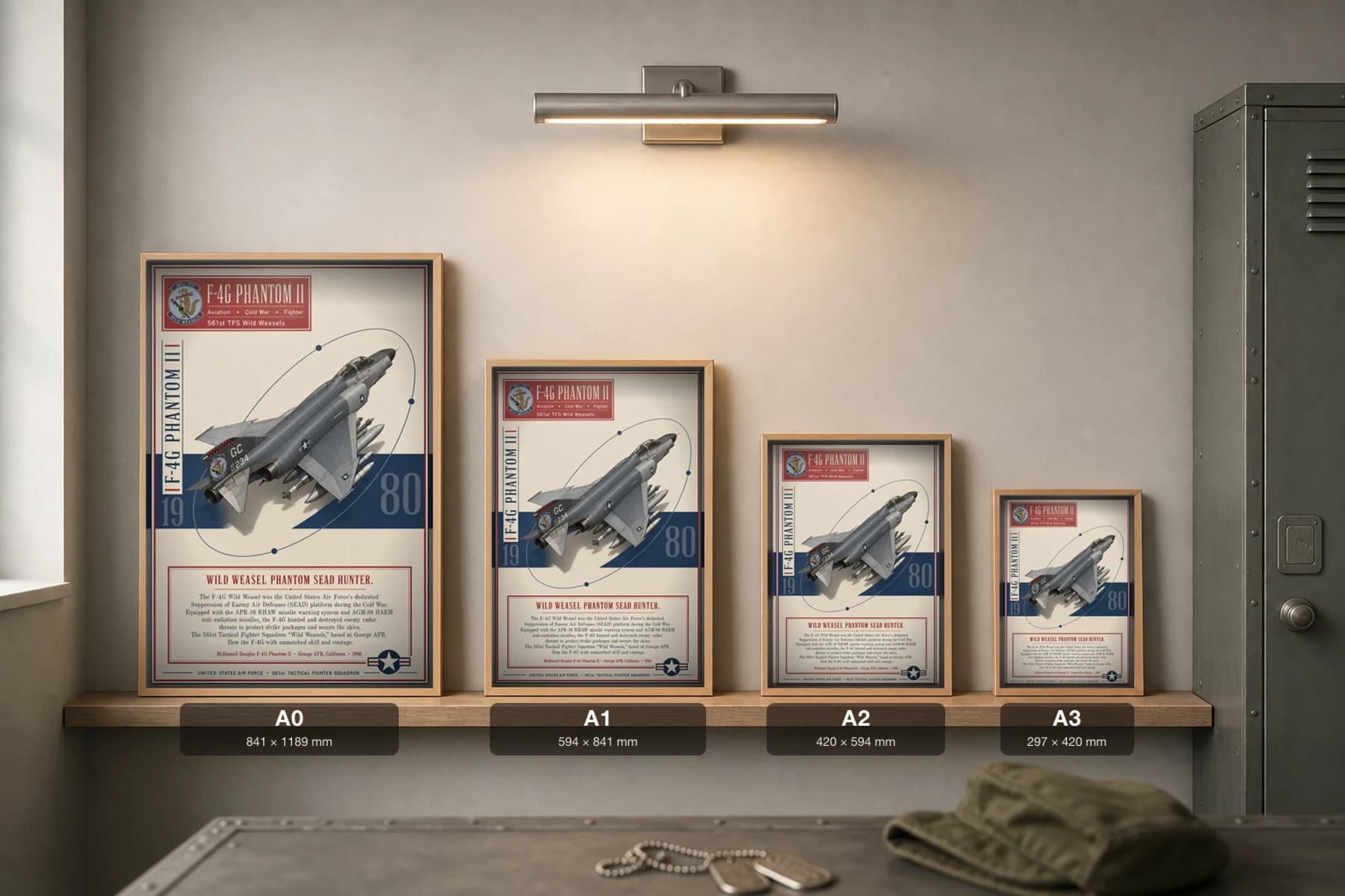 F-4G Phantom II Wild Weasel Poster — 561st TFS Wild Weasels military aviation wall art · framed A2 · 1980 — print size guide showing the artwork at A0, A1, A2 and A3 in natural-oak frames at true relative scale