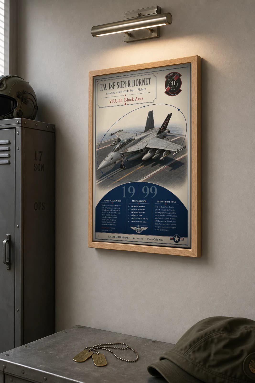 F/A-18F Super Hornet Poster — VFA-41 Black Aces military aviation wall art · framed A2 · 1999 — the framed print shown at a three-quarter angle on a styled gallery wall in a natural-oak frame