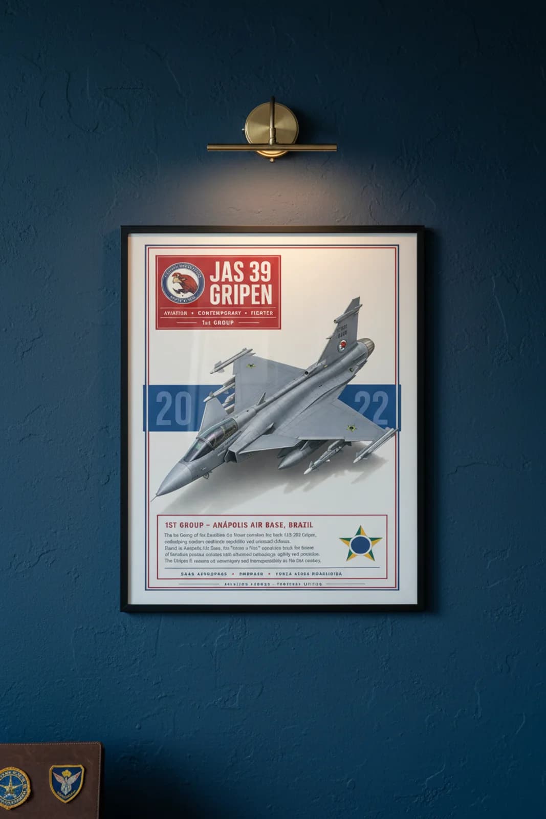 JAS 39 Gripen E aviation poster in black A2 frame on two-tone-grey navy hangar wall — Aviation Heroes mockup