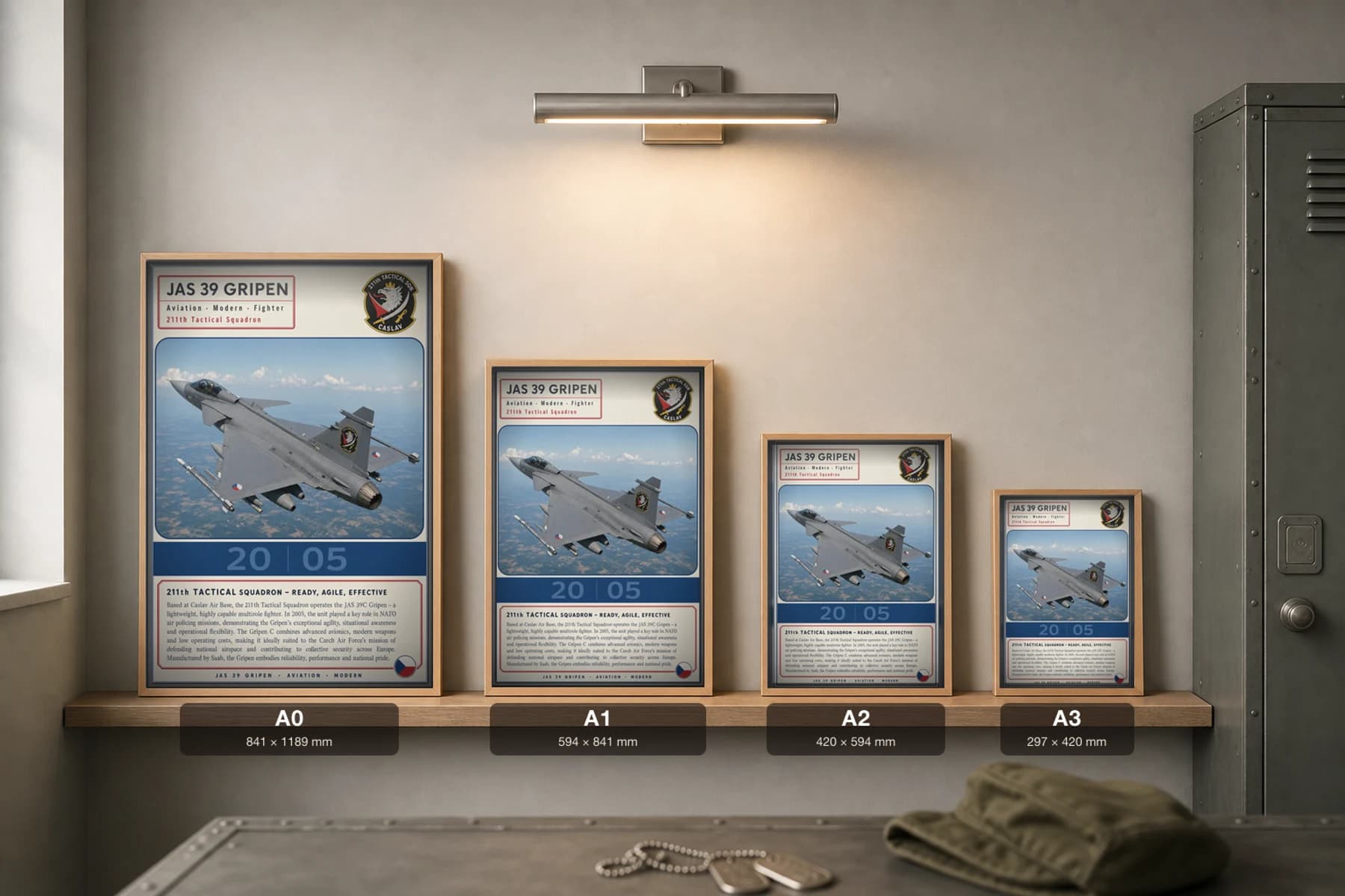 JAS 39 Gripen Poster — 211th Tactical Squadron military aviation wall art · framed A2 · 2005 — print size guide showing the artwork at A0, A1, A2 and A3 in natural-oak frames at true relative scale