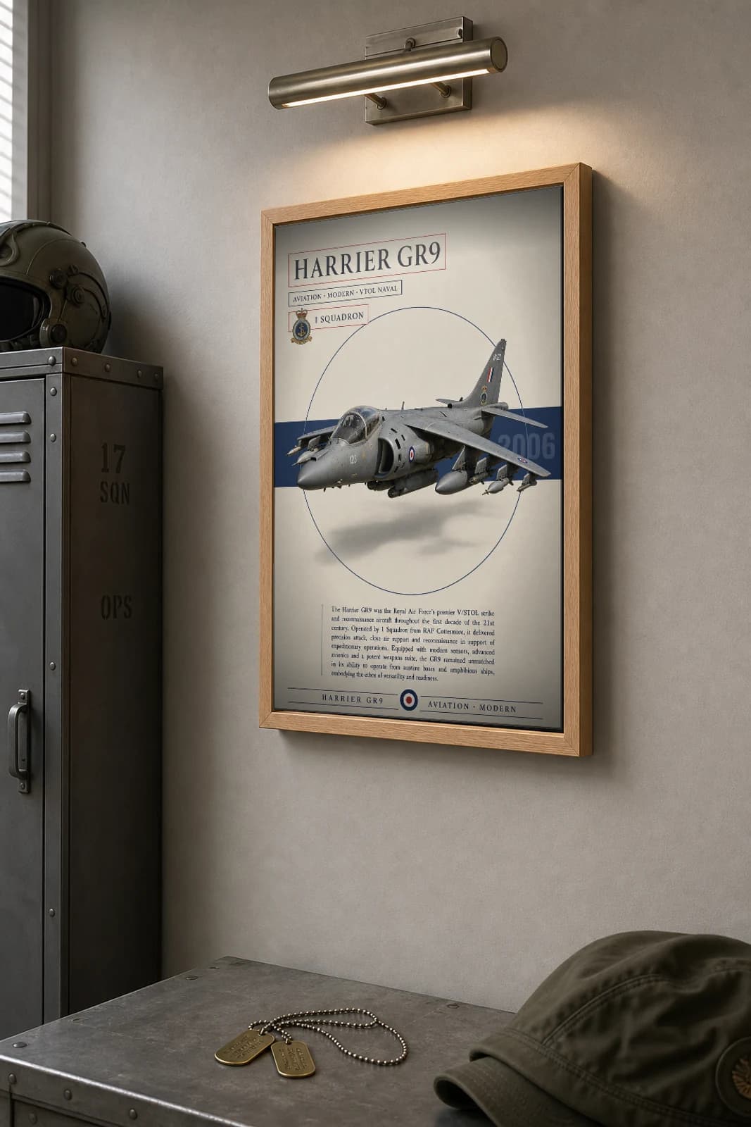 Harrier GR9 Poster — 1 Squadron military aviation wall art · framed A2 · 2006 — the framed print shown at a three-quarter angle on a styled gallery wall in a natural-oak frame