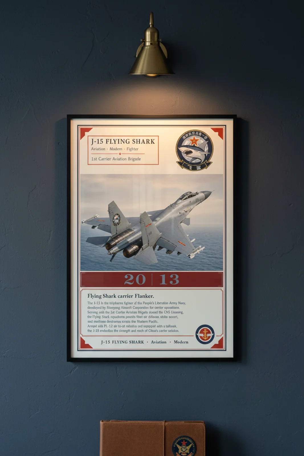 J-15 Flying Shark aviation poster in black A2 frame on plan-grey navy hangar wall — Aviation Heroes mockup