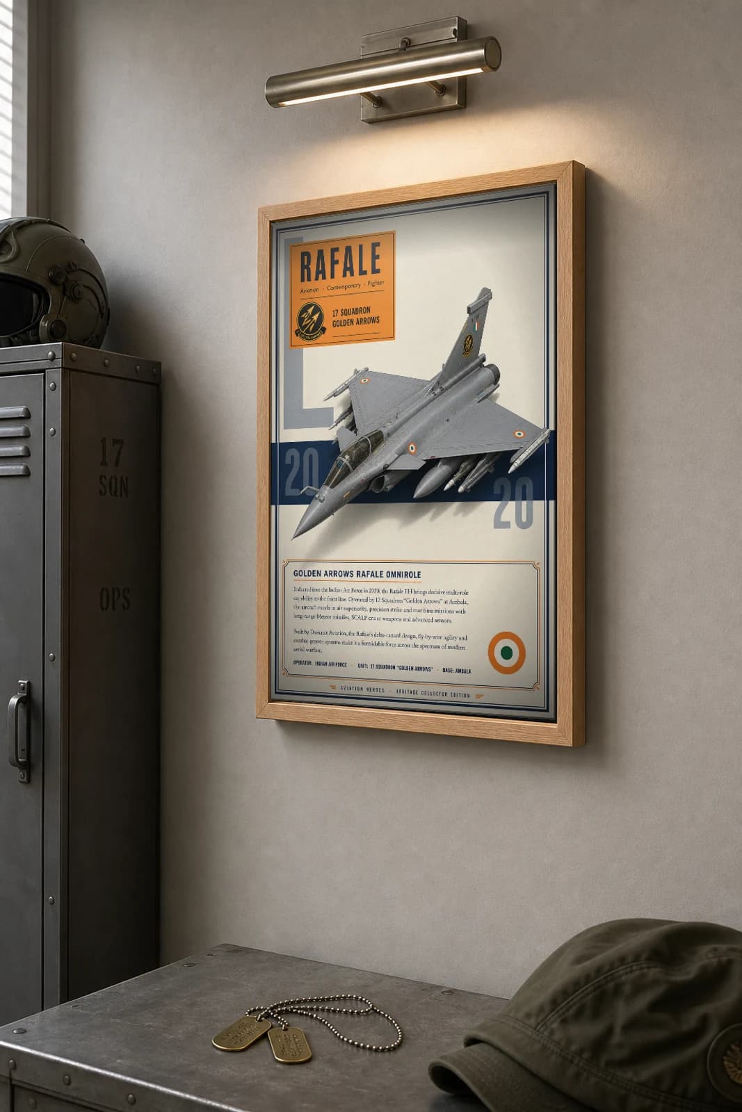 Dassault Rafale EH Poster — 17 Squadron Golden Arrows military aviation wall art · framed A2 · 2020 — the framed print shown at a three-quarter angle on a styled gallery wall in a natural-oak frame