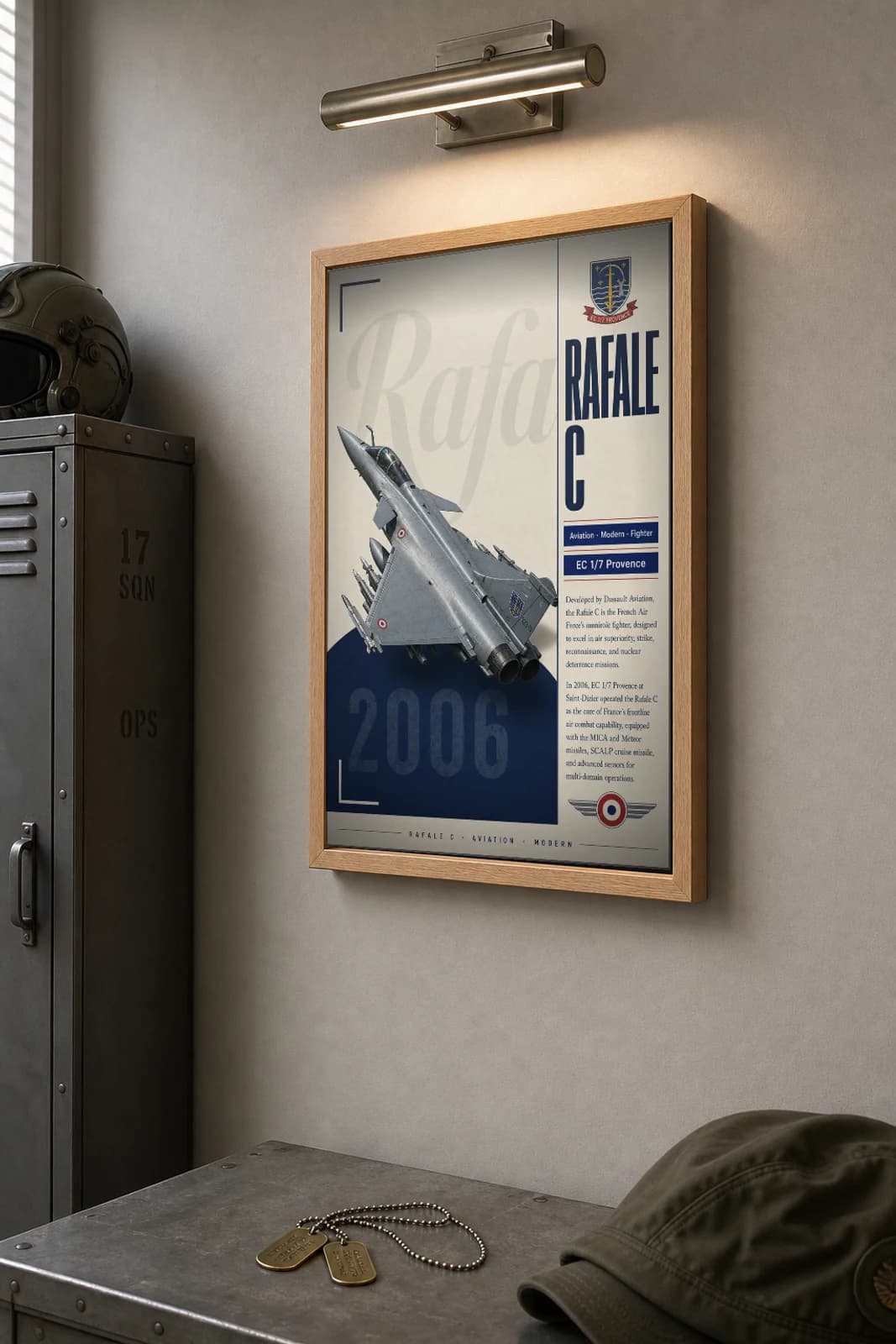 Rafale C Poster — EC 1/7 Provence military aviation wall art · framed A2 · 2006 — the framed print shown at a three-quarter angle on a styled gallery wall in a natural-oak frame