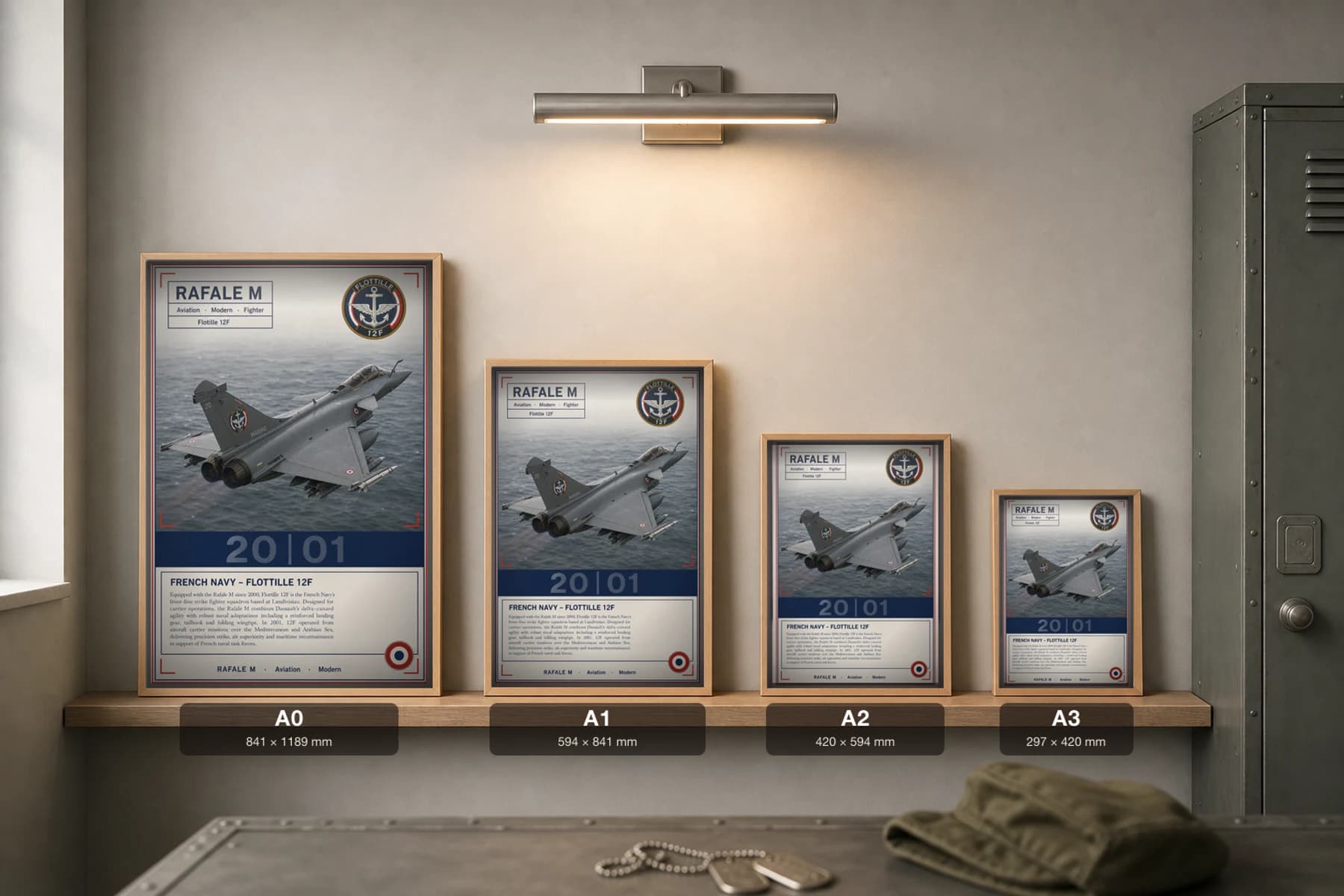 Rafale M Poster — Flottille 12F military aviation wall art · framed A2 · 2001 — print size guide showing the artwork at A0, A1, A2 and A3 in natural-oak frames at true relative scale
