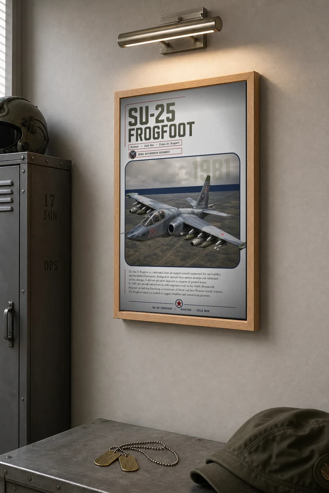 Su-25 Frogfoot Poster — 368th Shturmovik Regiment military aviation wall art · framed A2 · 1981 — the framed print shown at a three-quarter angle on a styled gallery wall in a natural-oak frame