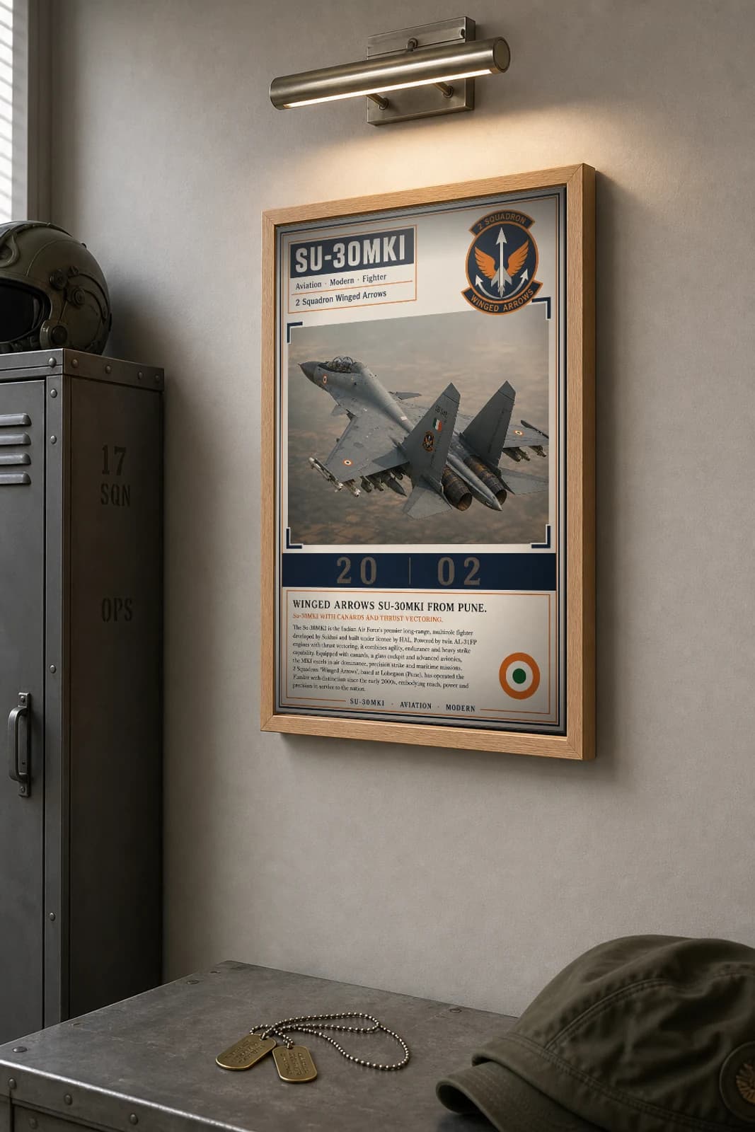 Su-30MKI Poster — 2 Squadron Winged Arrows military aviation wall art · framed A2 · 2002 — the framed print shown at a three-quarter angle on a styled gallery wall in a natural-oak frame