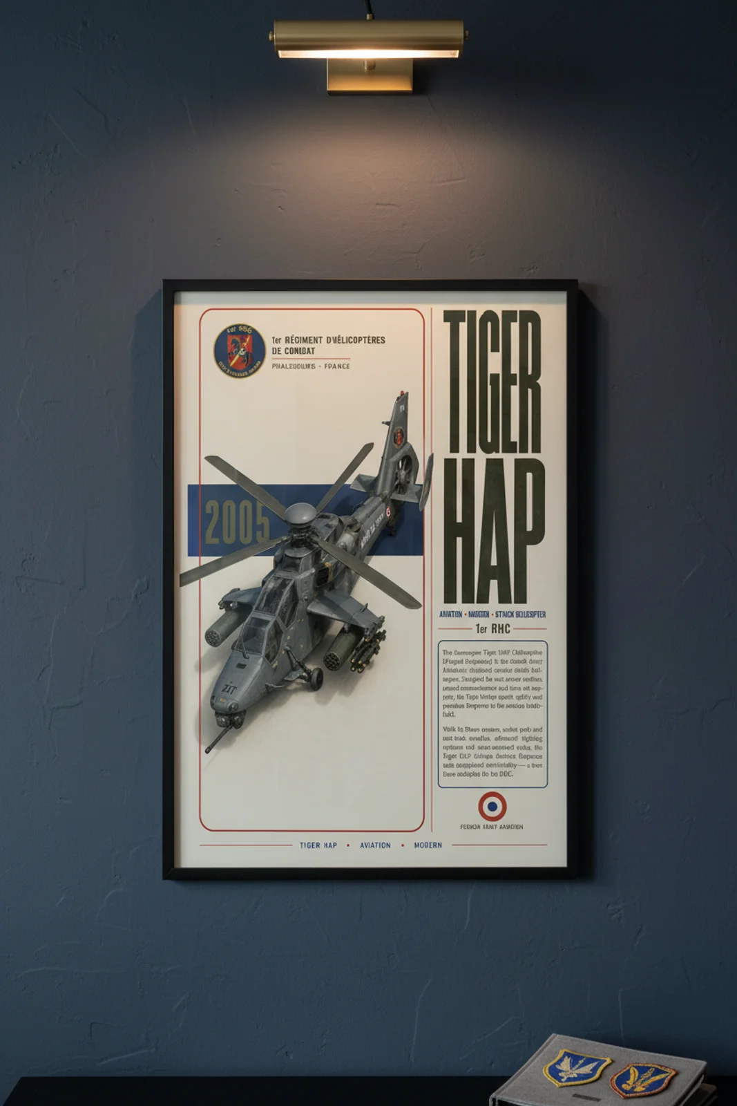 Tiger HAP aviation poster in black A2 frame on grey-camouflage navy hangar wall — Aviation Heroes mockup