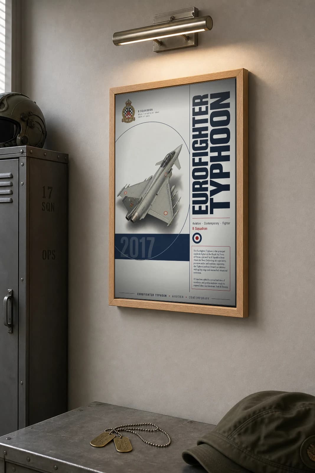Eurofighter Typhoon Poster — 8 Squadron military aviation wall art · framed A2 · 2017 — the framed print shown at a three-quarter angle on a styled gallery wall in a natural-oak frame