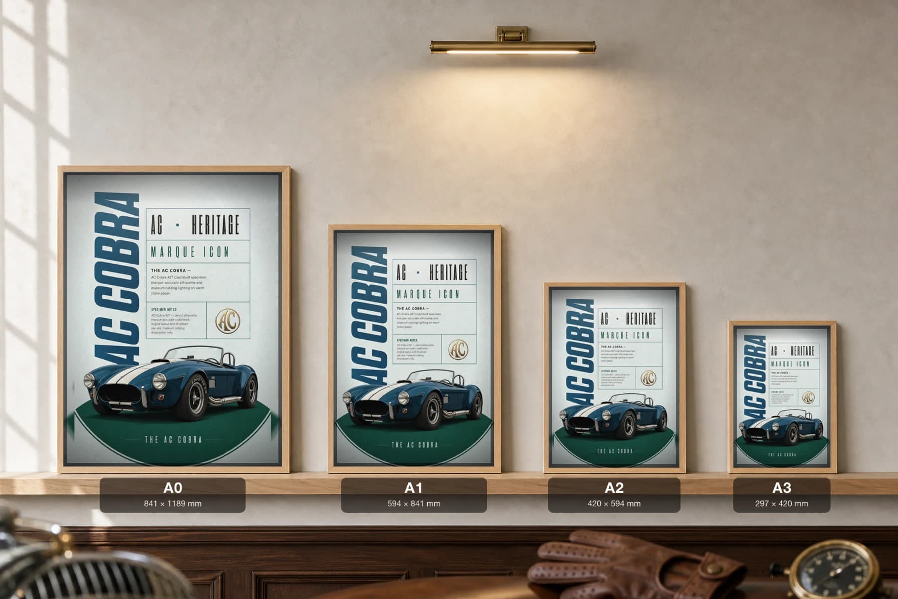 AC Cobra 427 Poster — 1965 roadster wall art · framed A2 · garage decor — print size guide showing the artwork at A0, A1, A2 and A3 in natural-oak frames at true relative scale