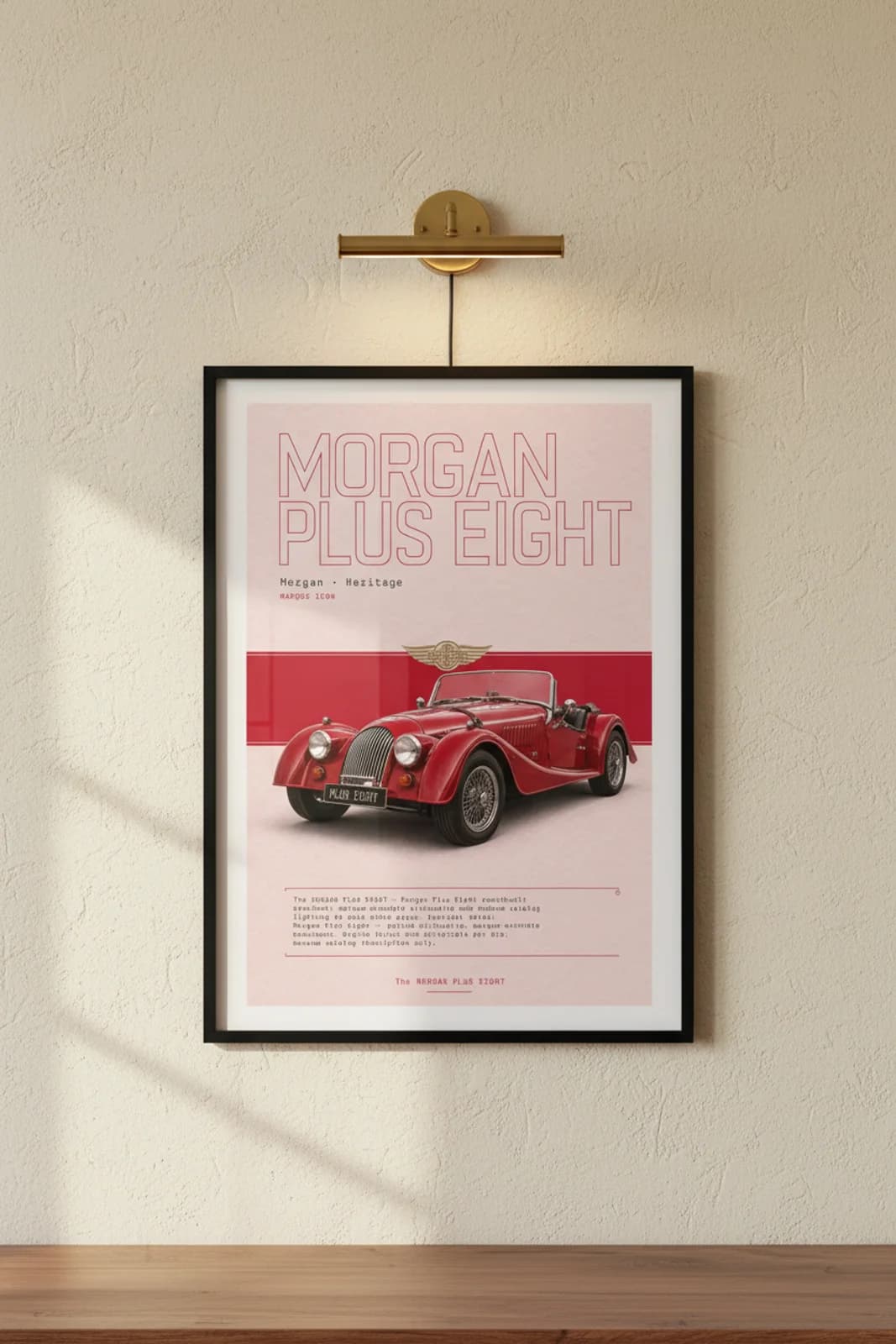 Morgan Plus Eight poster in black A2 frame on red-morgan lime-wash wall — Heritage Icons collector lounge mockup