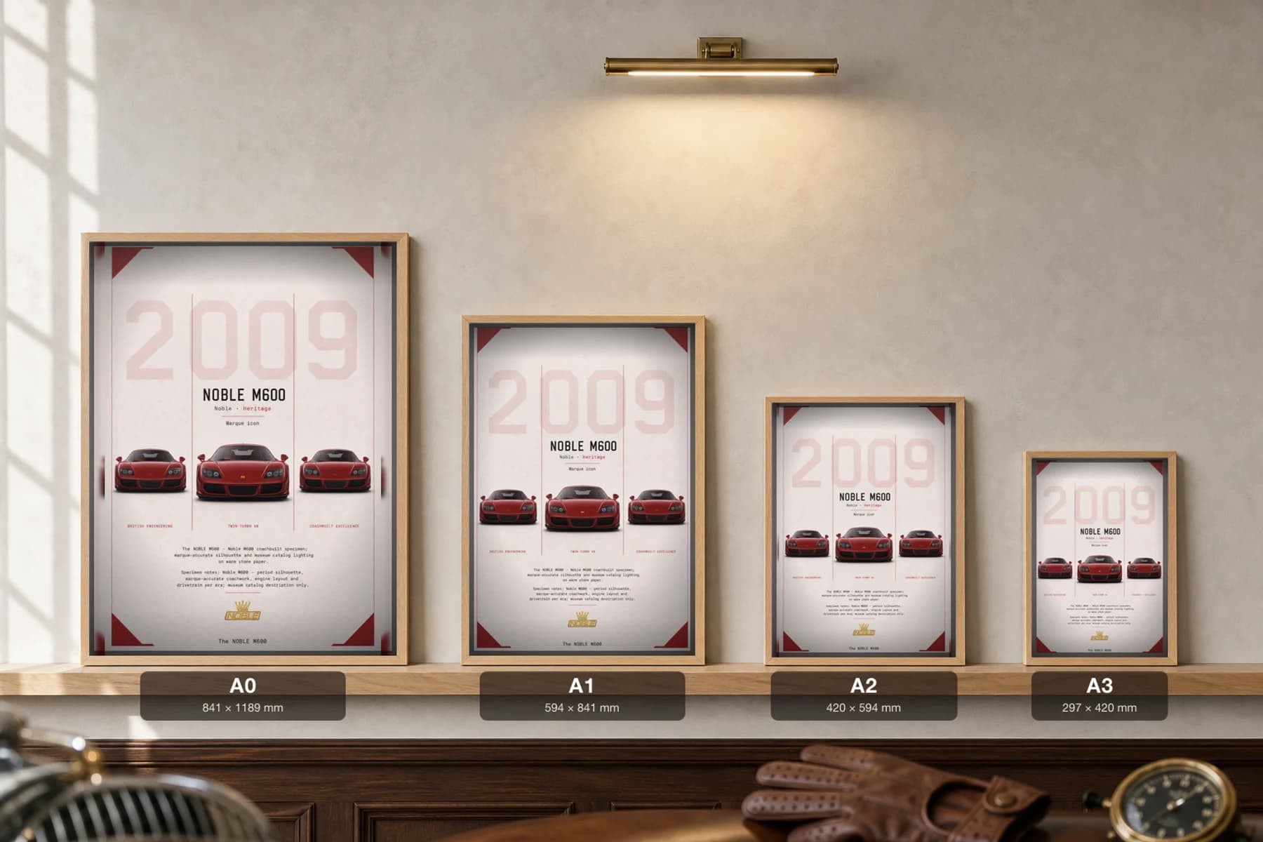 Noble M600 Poster — 2009 British supercar wall art · framed A2 · garage decor — print size guide showing the artwork at A0, A1, A2 and A3 in natural-oak frames at true relative scale