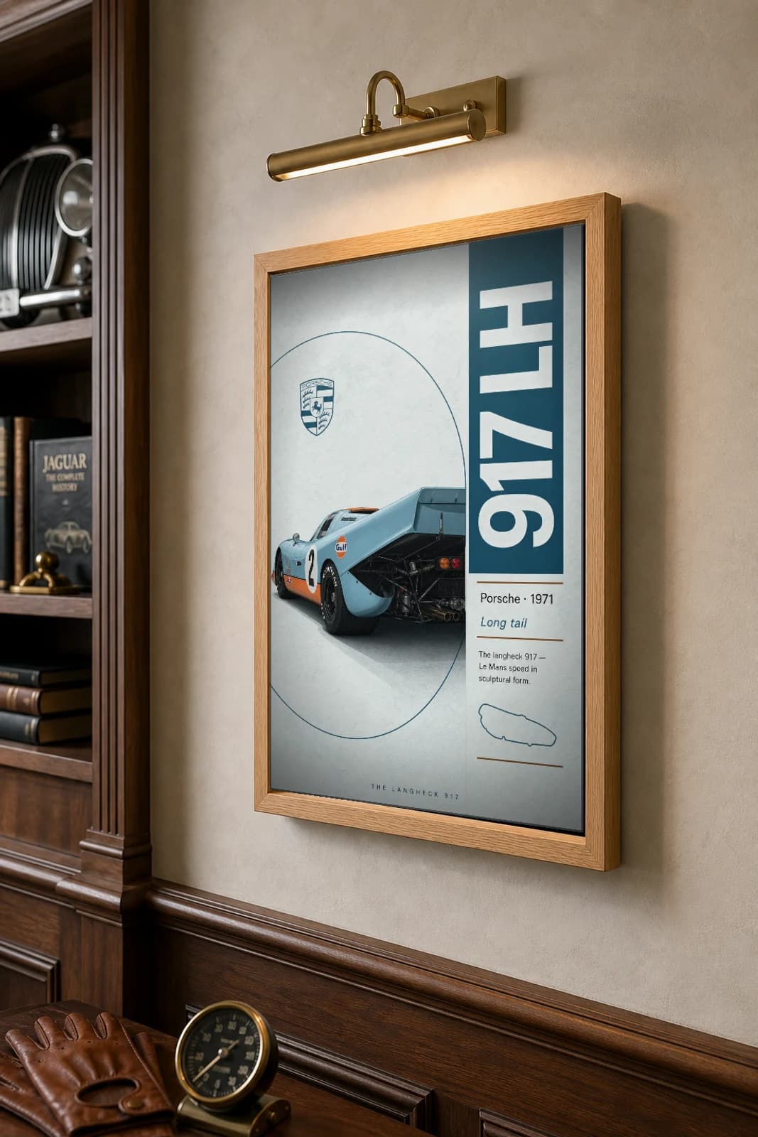 Porsche 917 Langheck Poster — 1971 Le Mans racing wall art · framed A2 · race den decor — the framed print shown at a three-quarter angle on a styled gallery wall in a natural-oak frame