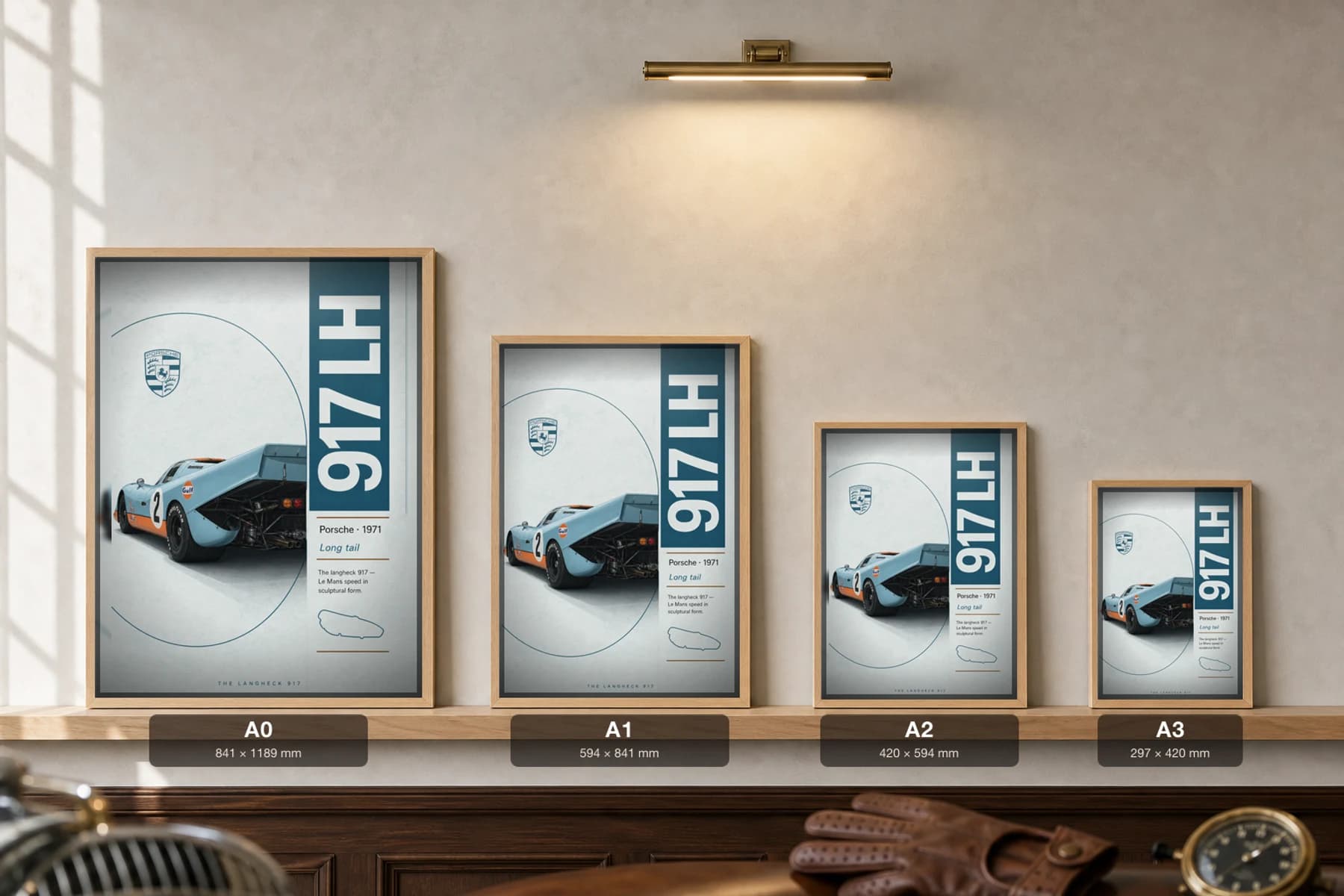 Porsche 917 Langheck Poster — 1971 Le Mans racing wall art · framed A2 · race den decor — print size guide showing the artwork at A0, A1, A2 and A3 in natural-oak frames at true relative scale
