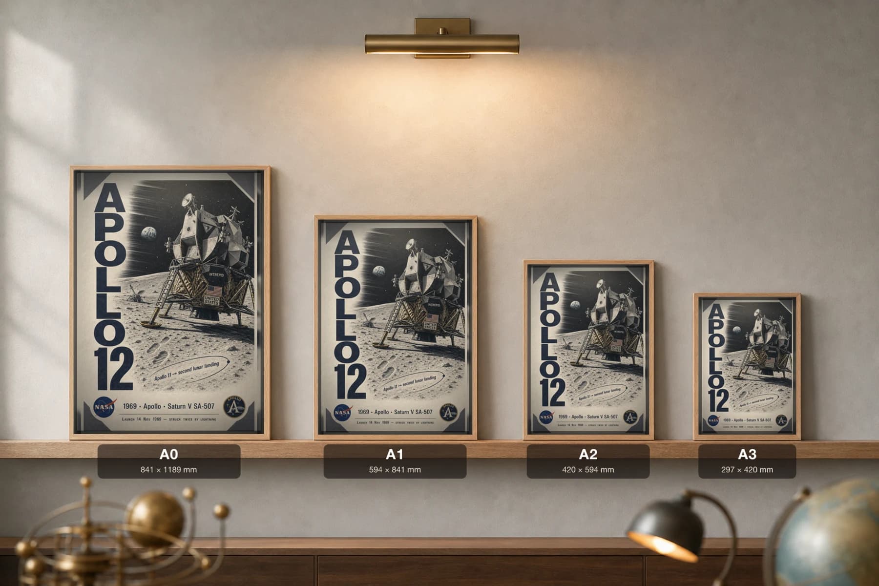 Apollo 12 Poster — 1969 Intrepid LM Ocean of Storms NASA Heritage Collector Print — print size guide showing the artwork at A0, A1, A2 and A3 in natural-oak frames at true relative scale