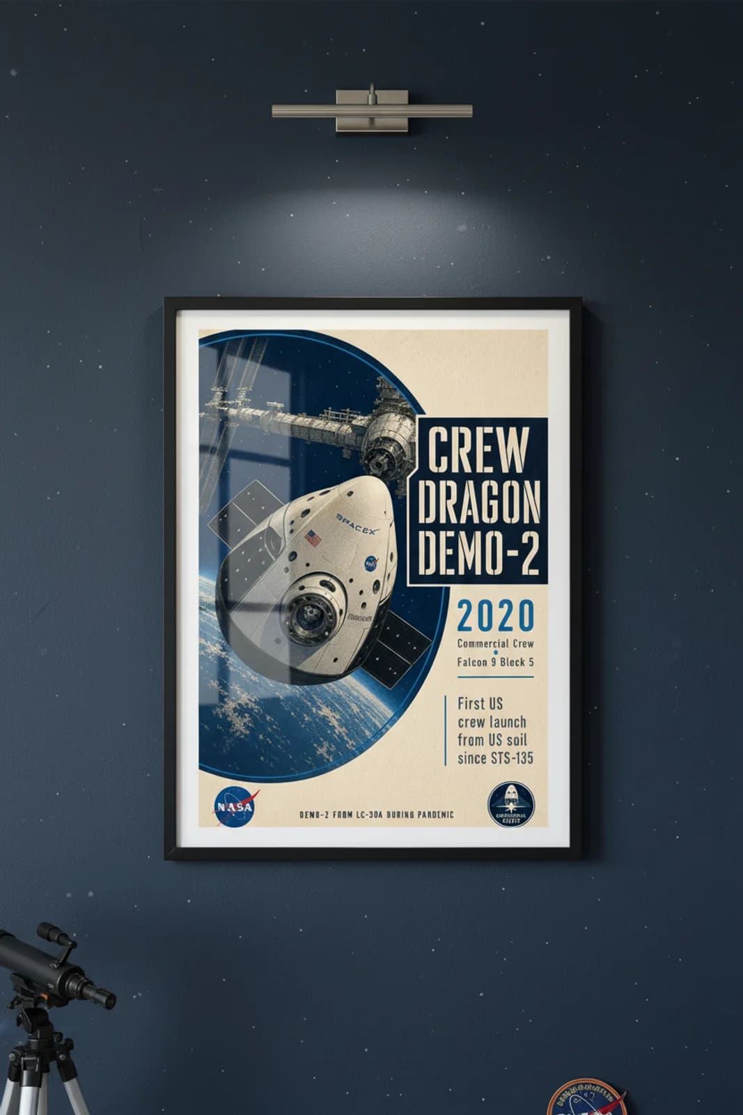 Crew Dragon Demo-2 poster in black A2 frame on station-orbit-blue deep space navy wall — NASA Heritage collector study mockup