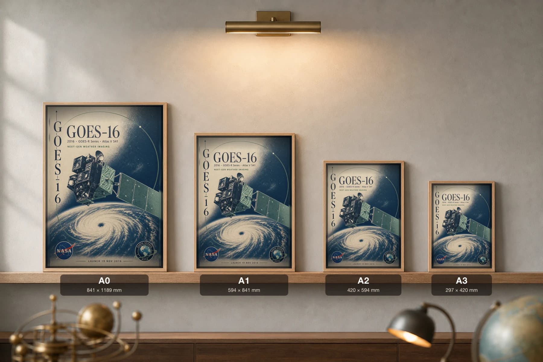 GOES-16 Poster — 2016 Next-Gen Weather Imaging NASA Heritage Collector Print — print size guide showing the artwork at A0, A1, A2 and A3 in natural-oak frames at true relative scale