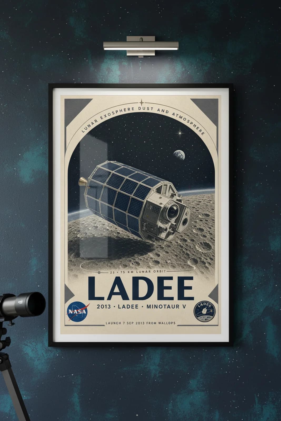 LADEE poster in black A2 frame on dark-navy-ladee-title deep space navy wall — NASA Heritage collector study mockup