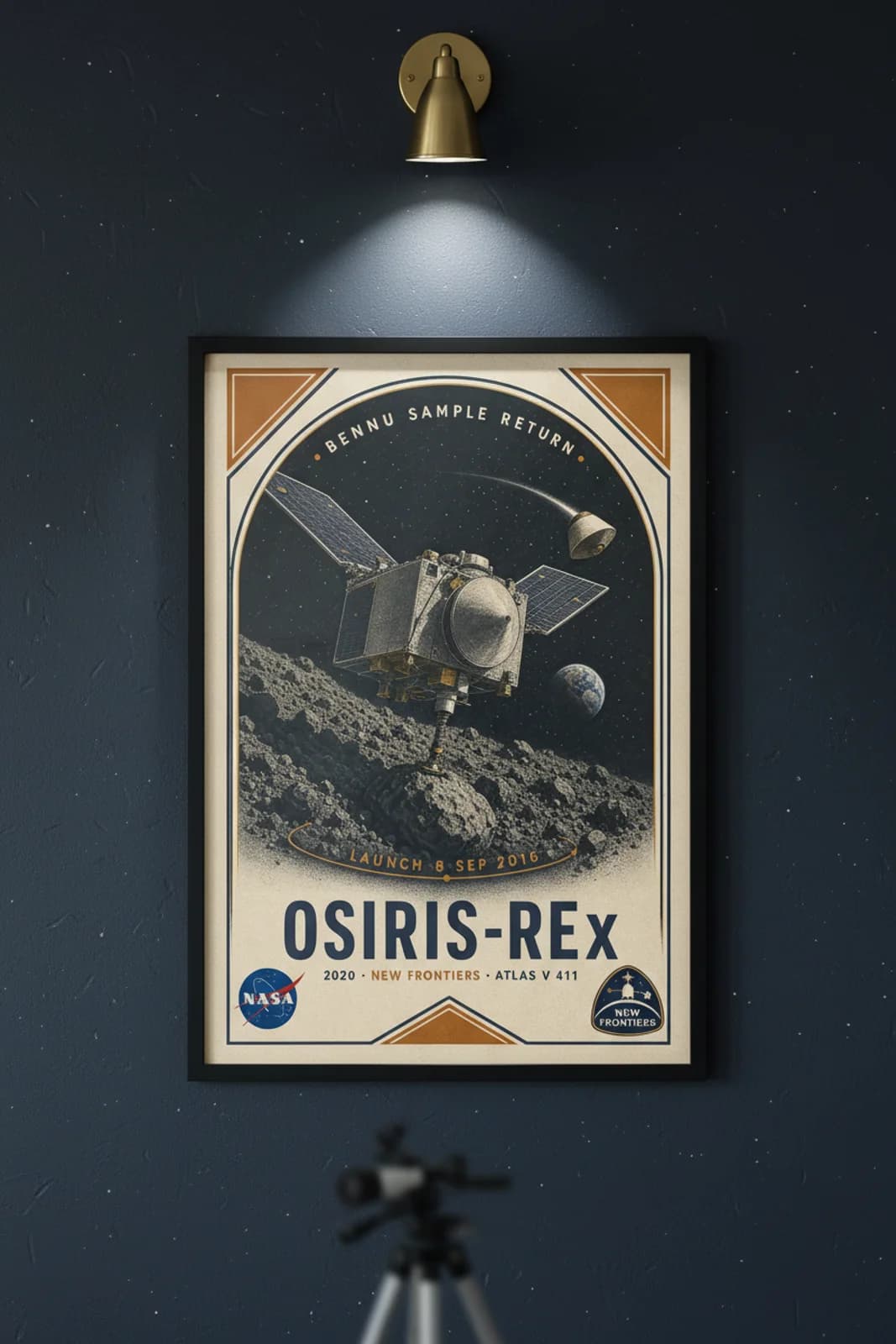 OSIRIS-REx poster in black A2 frame on dark-navy-osiris-title deep space navy wall — NASA Heritage collector study mockup