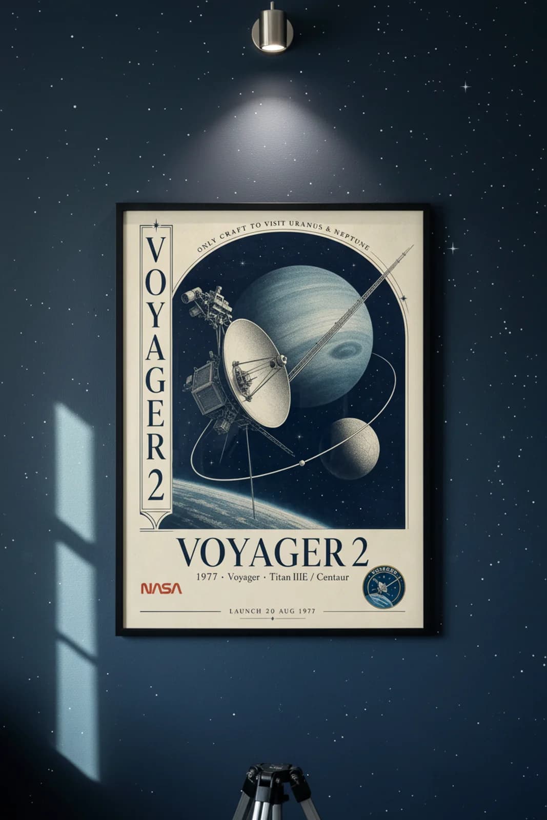 Voyager 2 — NASA Heritage Collector poster in black A2 frame on deep-navy-space deep space navy wall — NASA Heritage collector study mockup