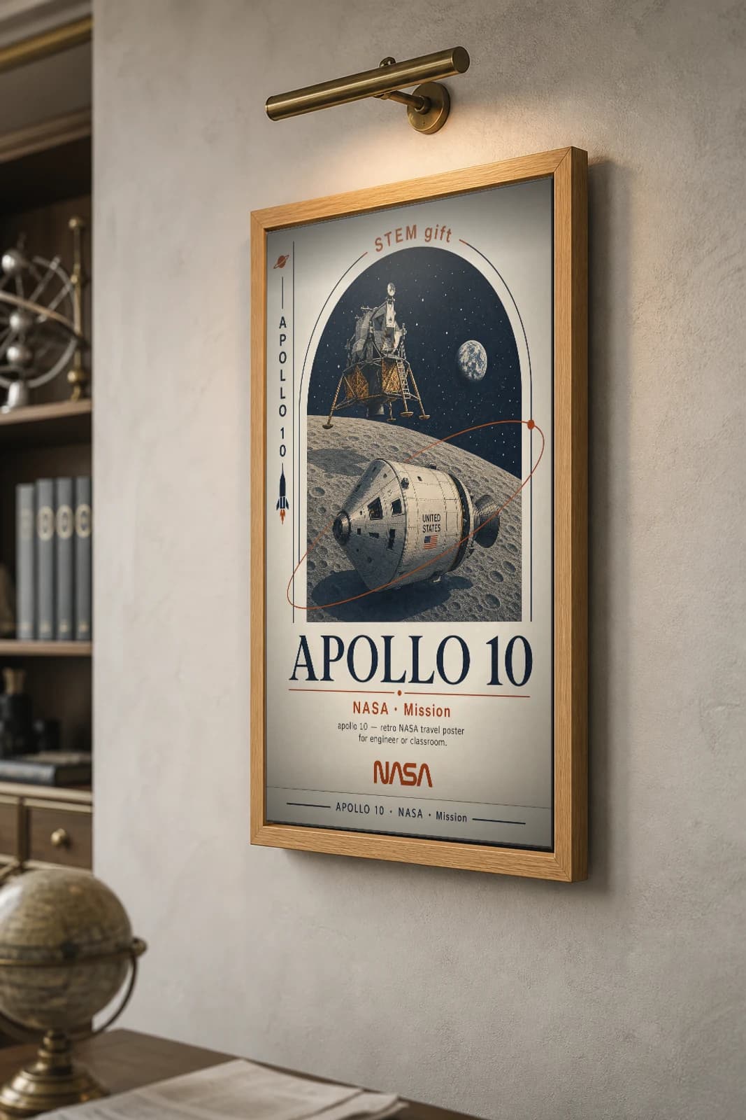 APOLLO 10 Poster — 1973 Saturn V / CSM-LM NASA Missions Commemorative Sheet — the framed print shown at a three-quarter angle on a styled gallery wall in a natural-oak frame