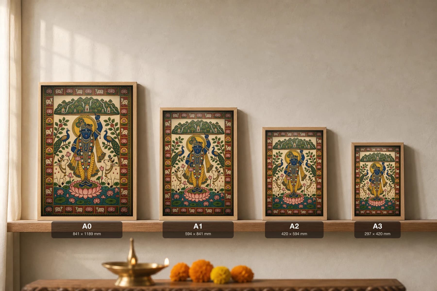 Shrinathji Darshan Pichwai-Style Print — The Govardhan-Lifter on a Lotus · collector A2 · Nathdwara, Rajasthan cloth-painting tradition — print size guide showing the artwork at A0, A1, A2 and A3 in natural-oak frames at true relative scale