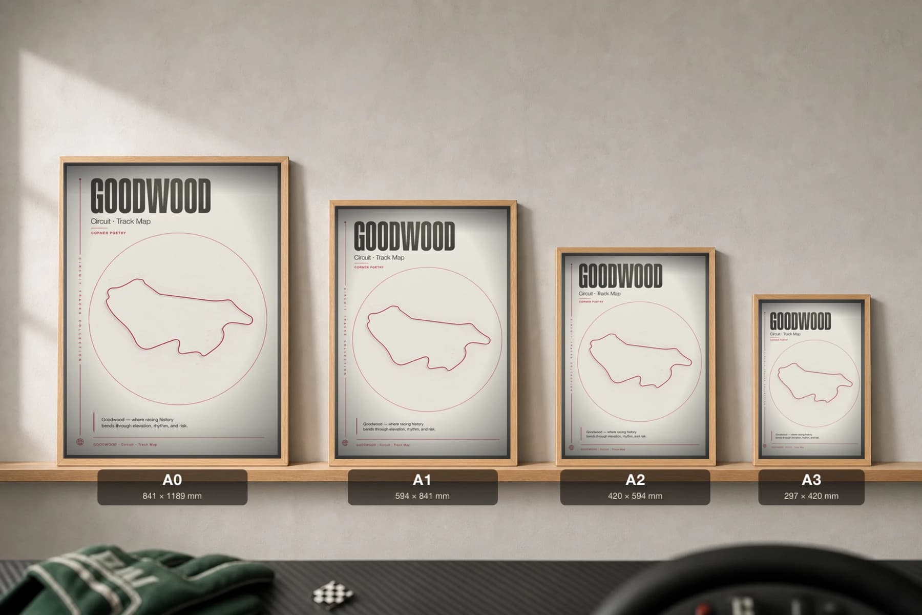 Goodwood Motor Circuit Poster — United Kingdom circuit map wall art · Goodwood Revival track layout · framed A2 — print size guide showing the artwork at A0, A1, A2 and A3 in natural-oak frames at true relative scale