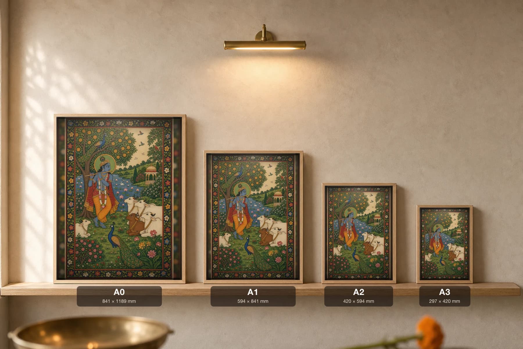 Krishna's Flute Rajput Miniature Print — Bundi Krishna-lila by the green Yamuna, cows and a peacock drawn to the flute · collector edition A2 — print size guide showing the artwork at A0, A1, A2 and A3 in natural-oak frames at true relative scale