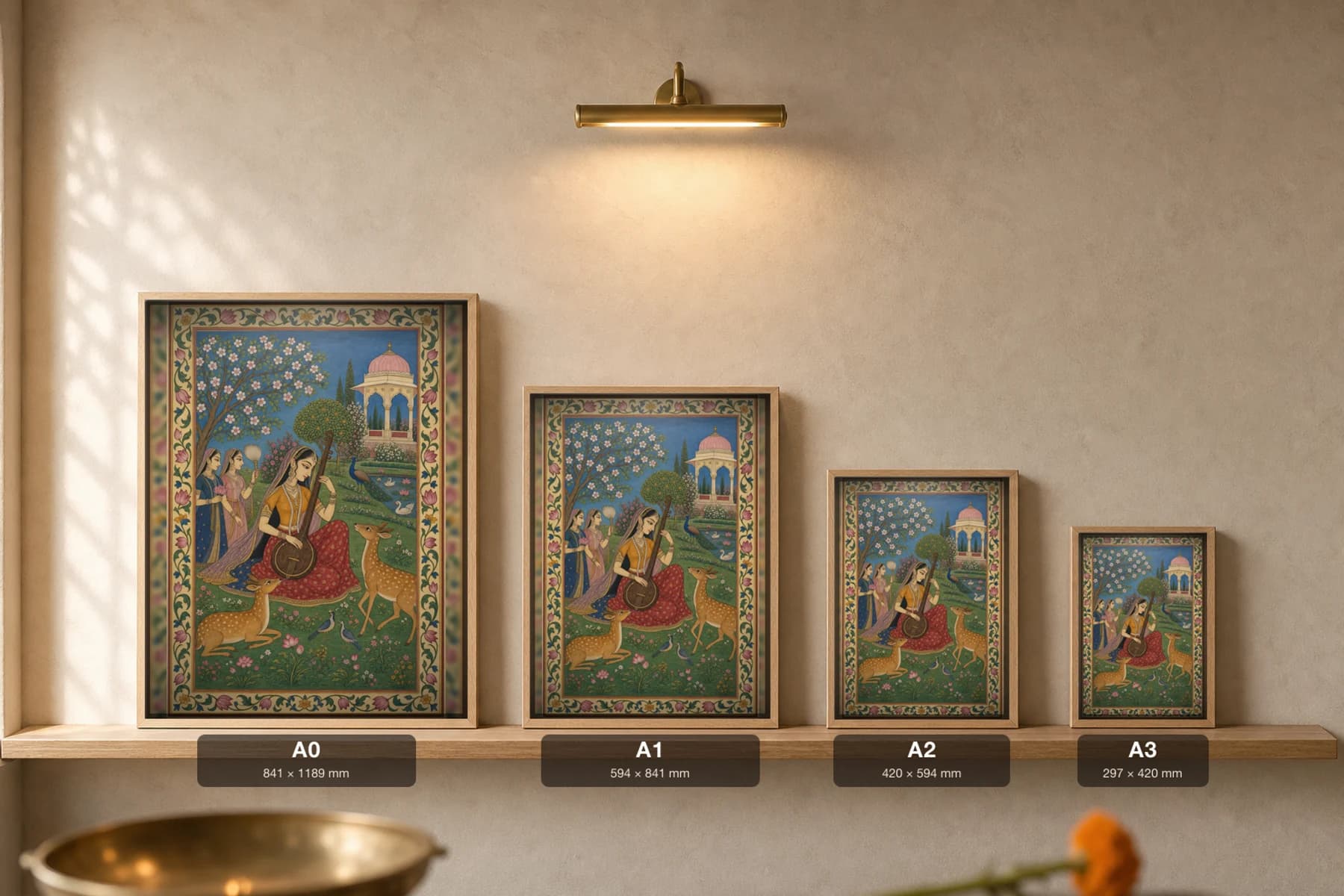 Todi Ragini Rajput Miniature Print — Kishangarh Ragamala, the veena-playing nayika charming the deer in a flowering garden · collector edition A2 — print size guide showing the artwork at A0, A1, A2 and A3 in natural-oak frames at true relative scale