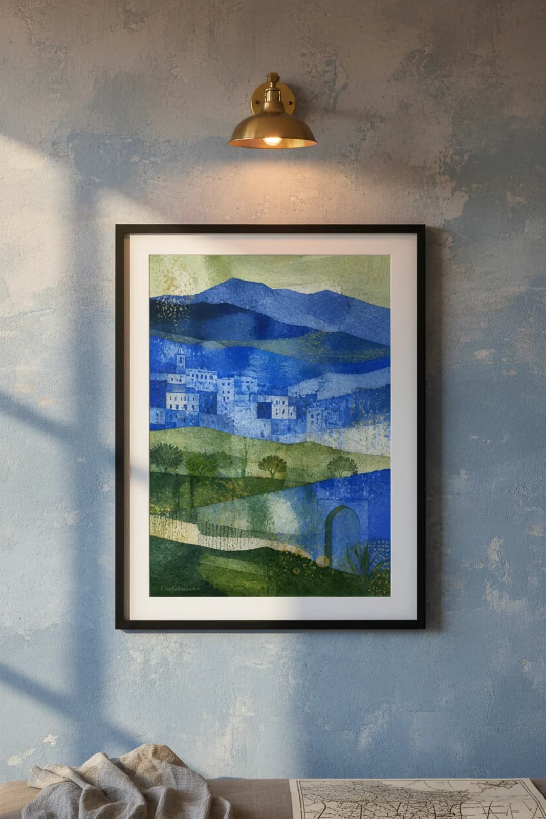 Chefchaouen Suncities travel print in black A2 frame on cobalt-blue concrete wall — Suncities mockup