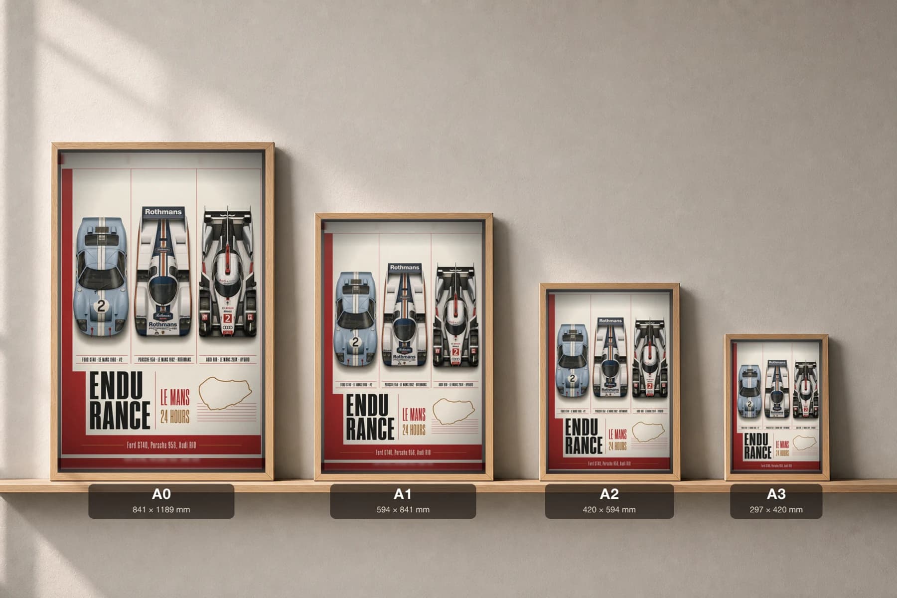 Factory / works endurance entries GT40 · 956 · R18 Poster —  Le Mans-winning sportscars · Group C prototype · LMP1 hybrid WEC racing wall art · #2 · framed A2 — print size guide showing the artwork at A0, A1, A2 and A3 in natural-oak frames at true relative scale