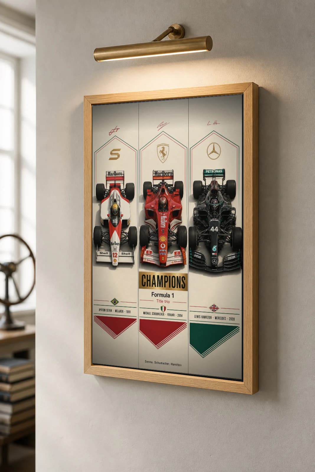 Champions — Senna · Schumacher · Hamilton Poster — McLaren (Brazil) · Ferrari (Italy) · Mercedes (United Kingdom) racing driver wall art · framed A2 — the framed print shown at a three-quarter angle on a styled gallery wall in a natural-oak frame