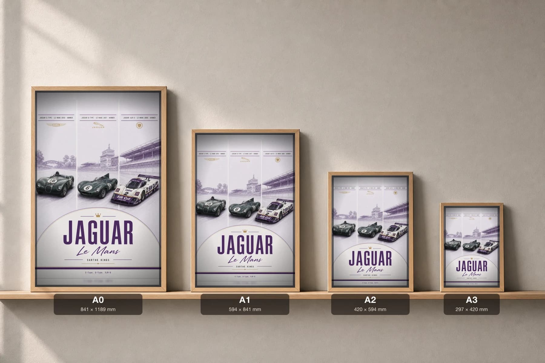 Jaguar factory / works entries C-Type / D-Type / XJR-9 Poster —  Le Mans-winning sportscars WEC racing wall art · #18 / 6 / 2 · framed A2 — print size guide showing the artwork at A0, A1, A2 and A3 in natural-oak frames at true relative scale